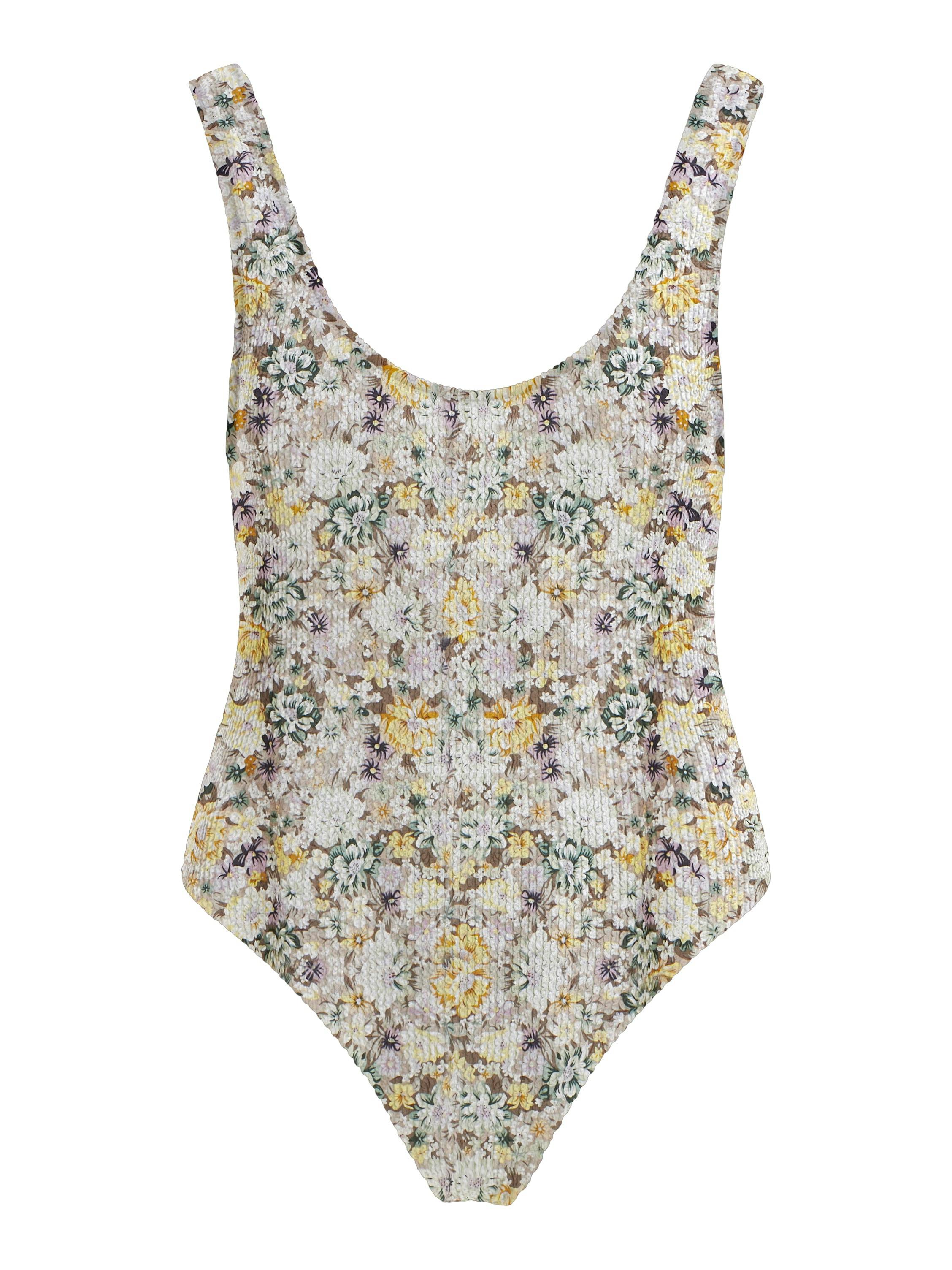 Badedragt med blomsterprint og rynkestof.