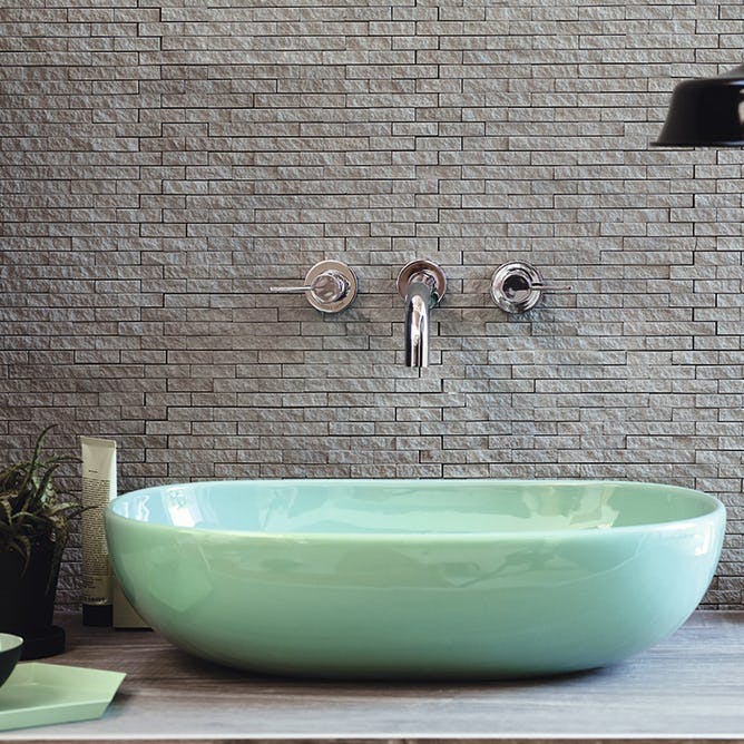 Badeværelsesvask i mintgrøn.