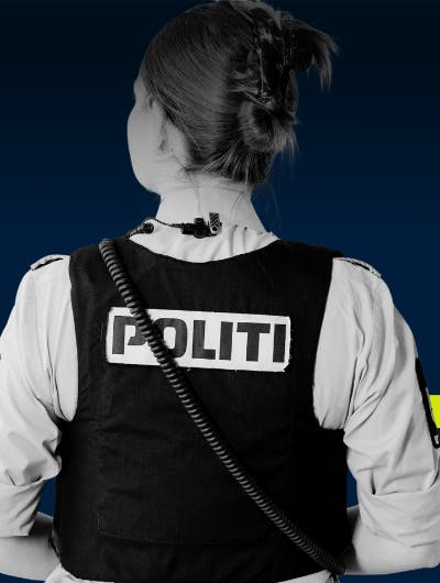 politibetjent med ryggen til, genrefoto