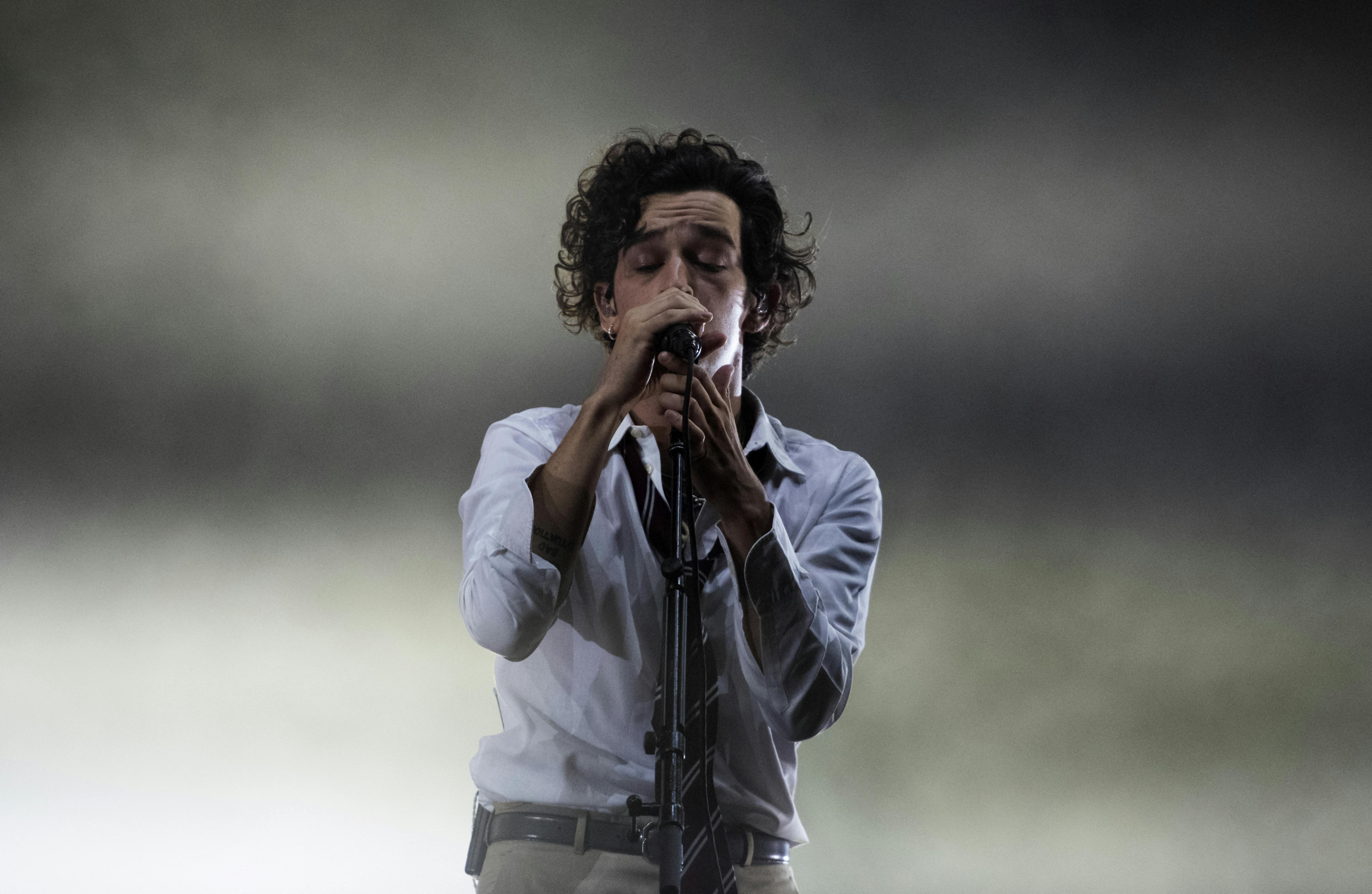 The leader singer of British pop rock band The 1975, Matt Healy, performs on the second day of the Benicassim International Music Festival (FIB) in Benicassim, Spain, early on July 20, 2019. JOSE JORDAN / AFP