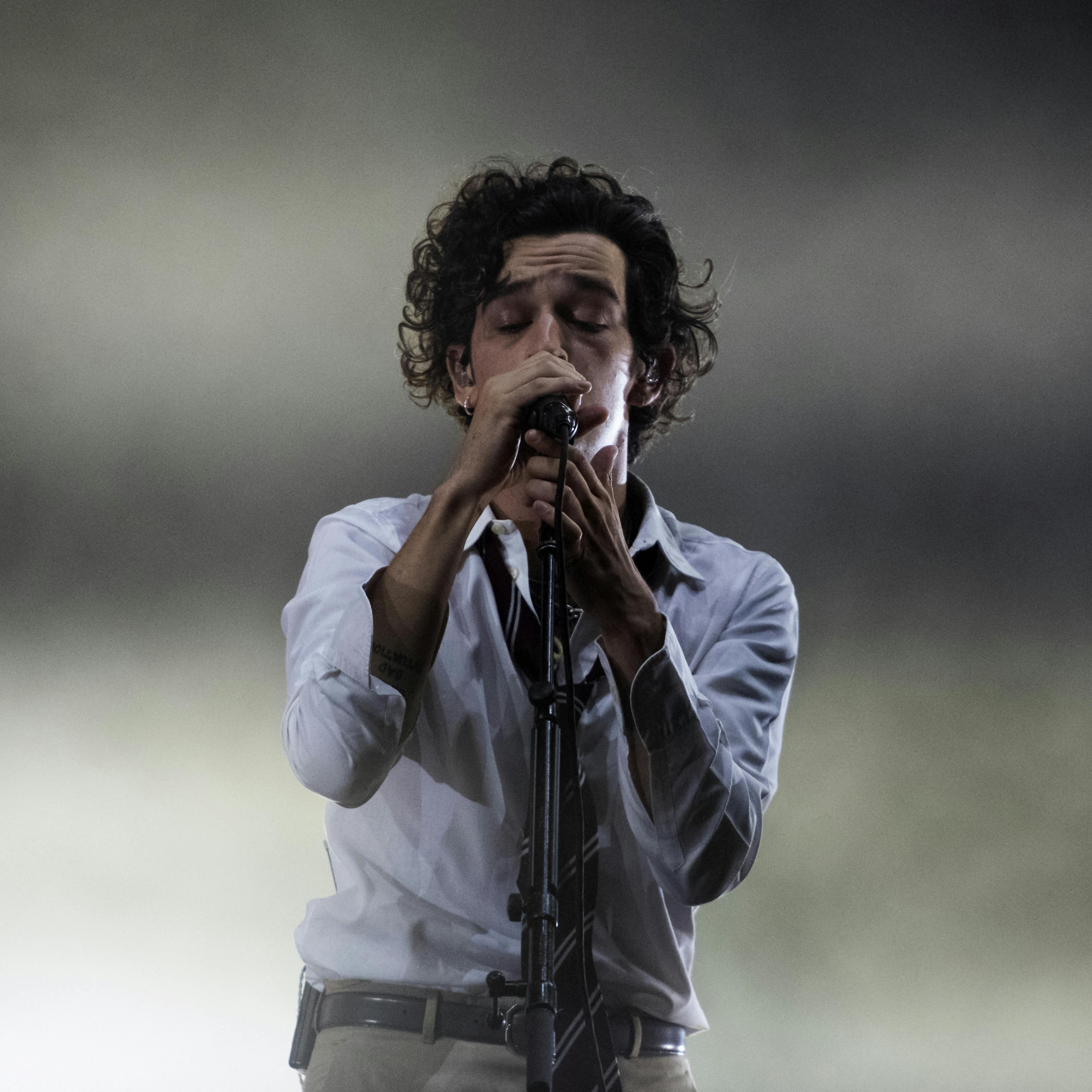 The leader singer of British pop rock band The 1975, Matt Healy, performs on the second day of the Benicassim International Music Festival (FIB) in Benicassim, Spain, early on July 20, 2019. JOSE JORDAN / AFP