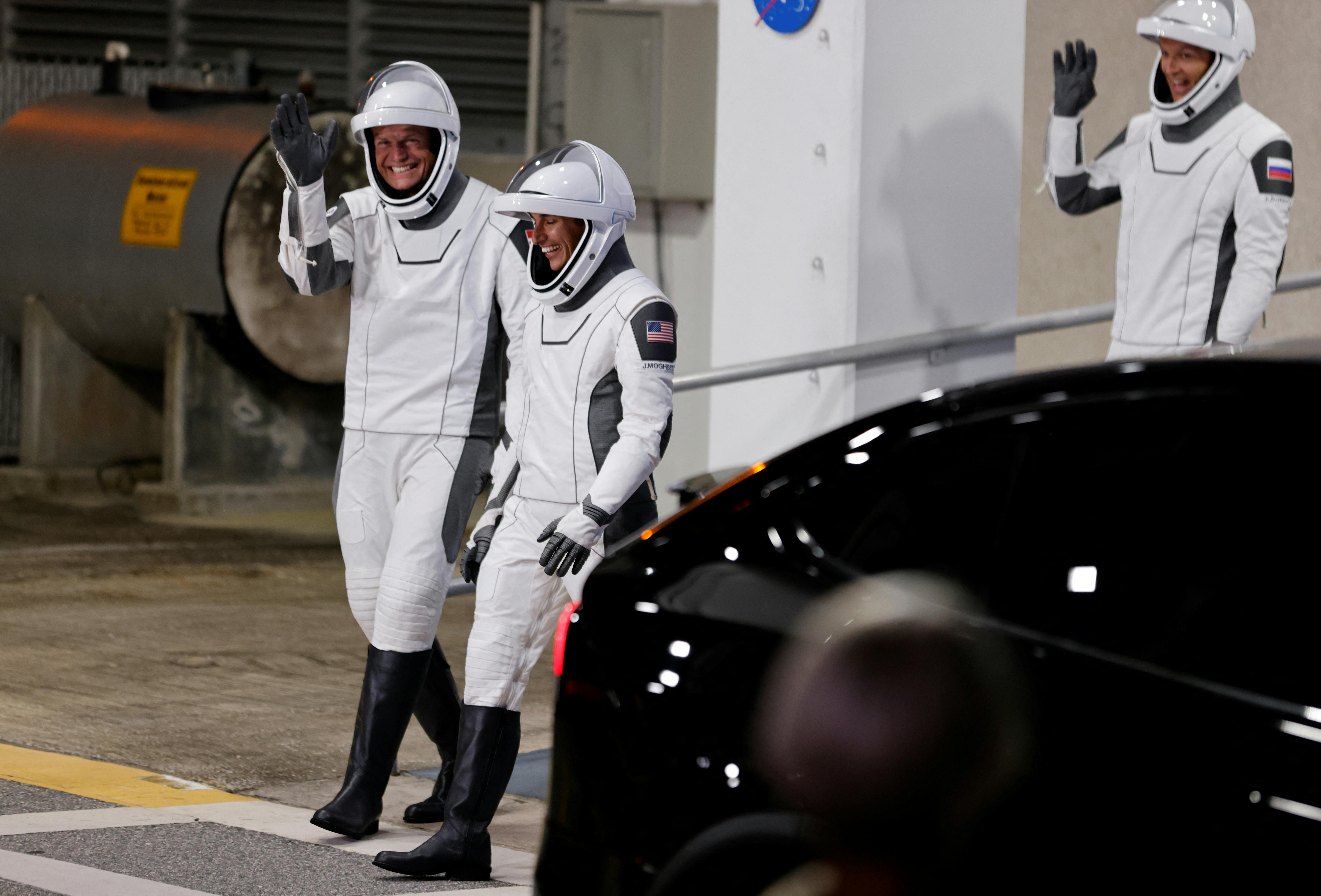 NASA astronaut Jasmin Moghbeli, European Space Agency astronaut Andreas Mogensen and Roscosmos cosmonaut Konstantin Borisov depart their crew quarters for the launch pad before their mission to the International Space Station as Crew-7 on the SpaceX Crew Dragon spacecraft at Cape Canaveral, Florida, U.S. August 26, 2023. REUTERS/Joe Skipper REFILE - CORRECTING DATE