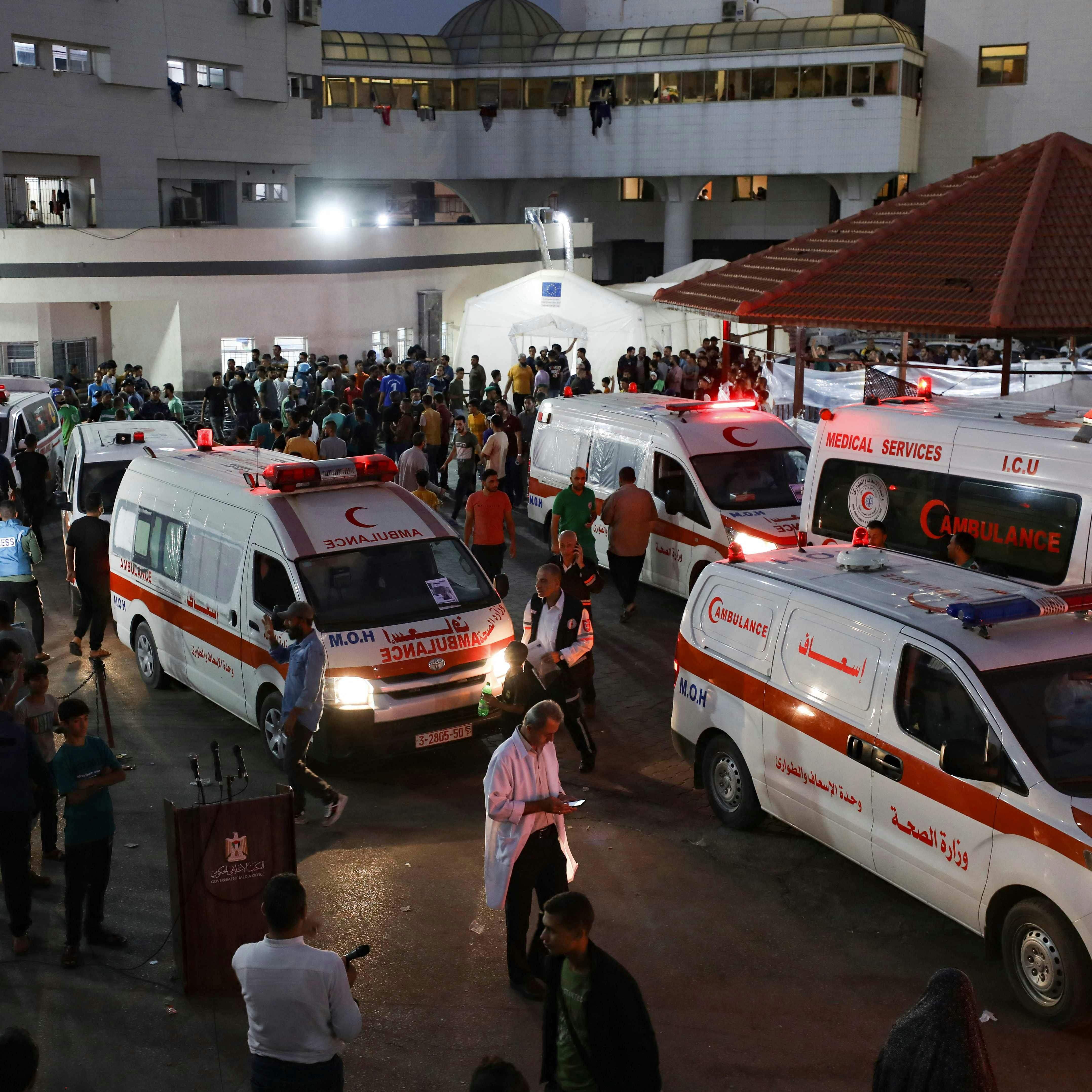 Ambulances carrying victims of Israeli strikes crowd the entrance to the emergency ward of the Al-Shifa hospital in Gaza City on October 15, 2023. Israel embarked on a withering air campaign against Hamas militants in Gaza after they carried out a brutal attack on Israel on October 7 that left more than 1, 400 people killed in Israel. (Photo by Dawood NEMER / AFP)