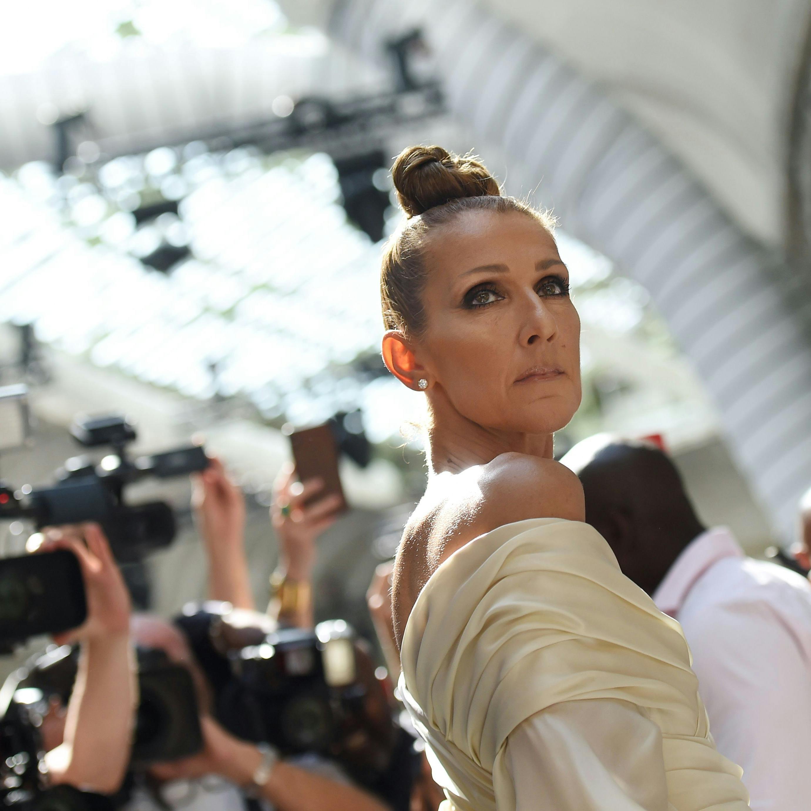 TOPSHOT - Canadian singer Celine Dion poses as she arrives for the Alexandre Vauthier Women's Fall-Winter 2019/2020 Haute Couture collection fashion show in Paris, on July 2, 2019. (Photo by Lucas BARIOULET / AFP)