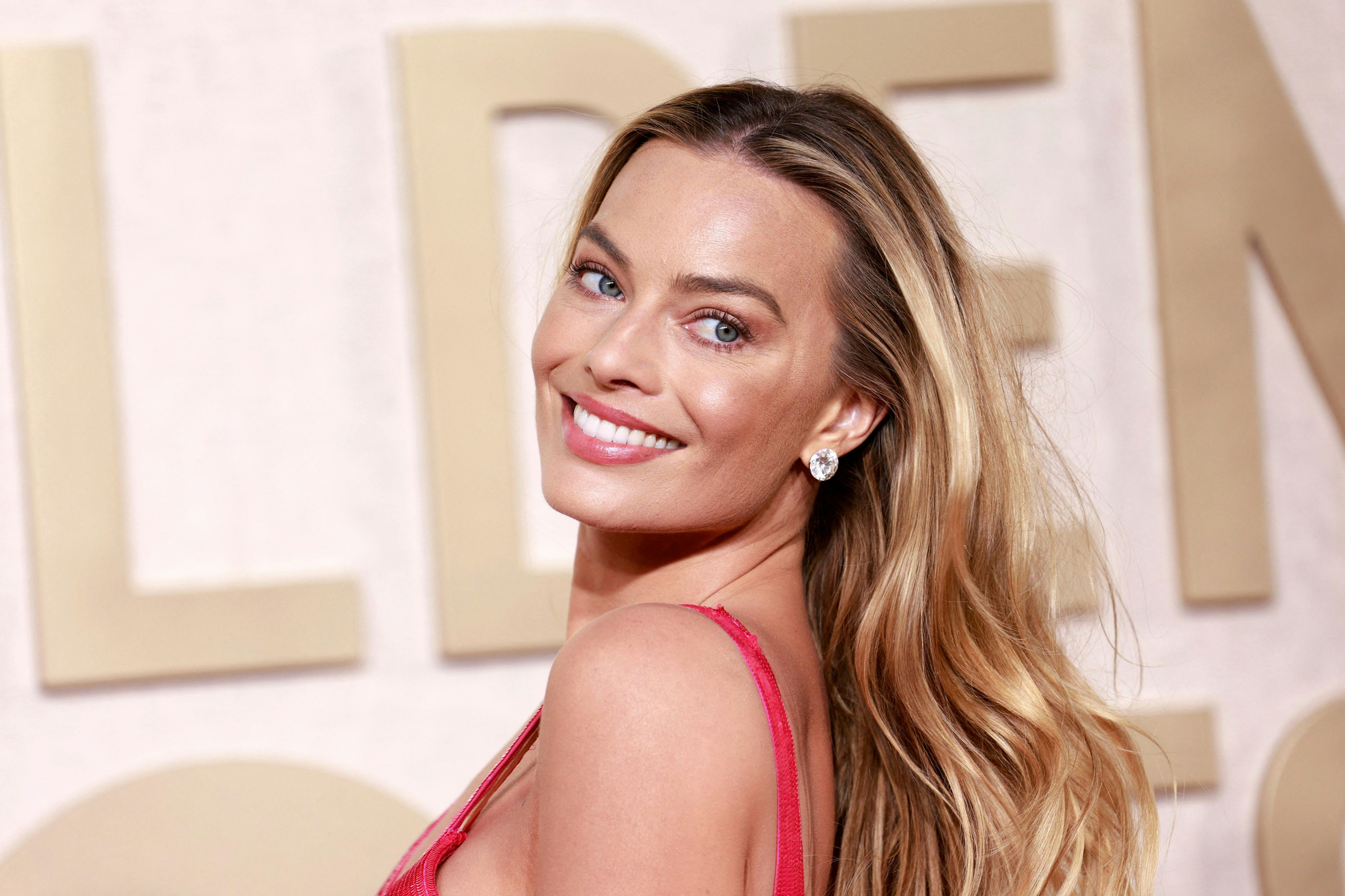 Australian actress Margot Robbie arrives for the 81st annual Golden Globe Awards at The Beverly Hilton hotel in Beverly Hills, California, on January 7, 2024. (Photo by Michael TRAN / AFP)