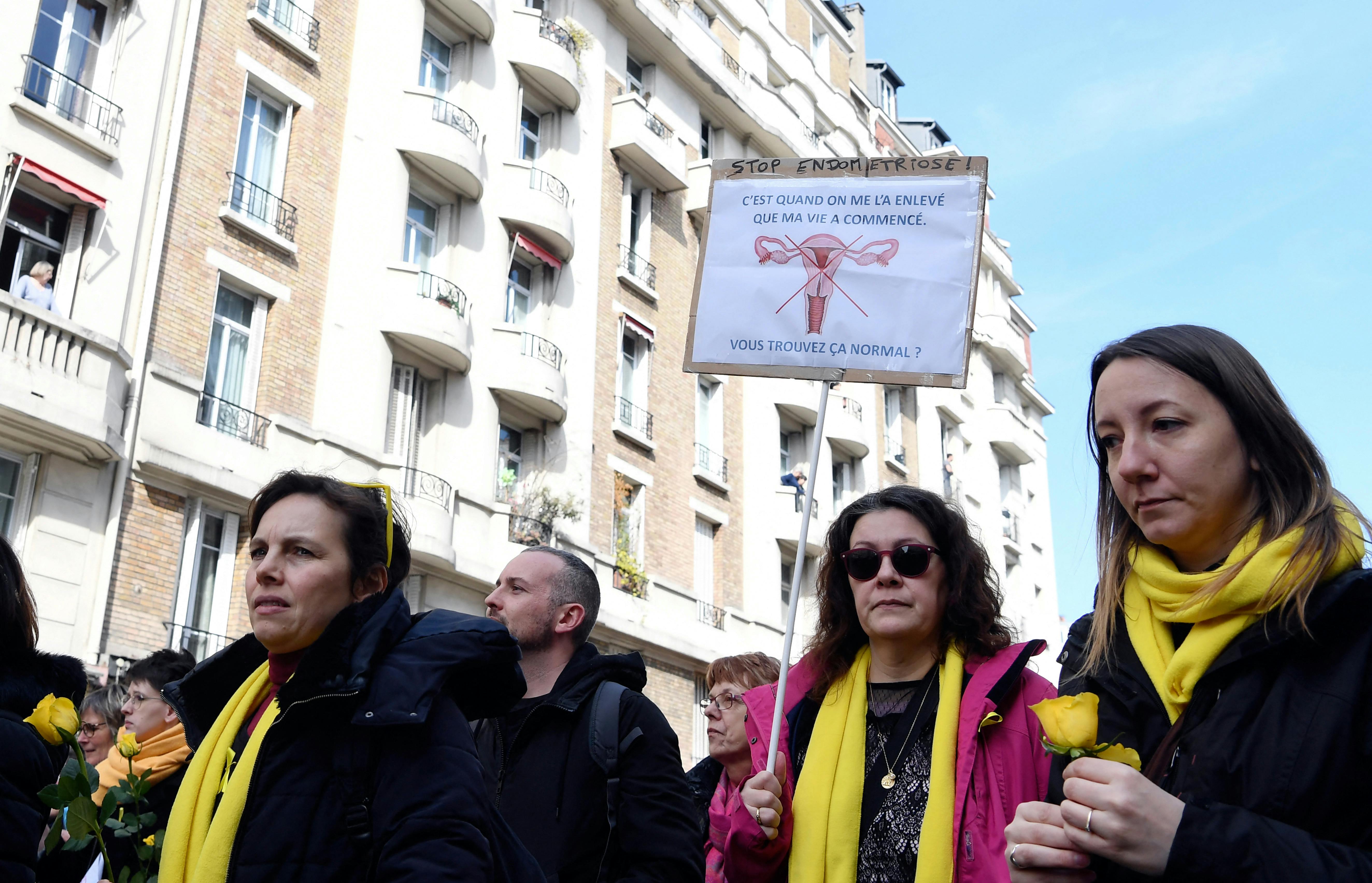 People take part in the fifth annual worldwide EndoMarch and world Endometriosis Day, hosted by the French associations Association ENDOmind and MEMS France (Mon Endometriose Ma Souffrance) on March 24, 2018, in Paris. ALAIN JOCARD / AFP