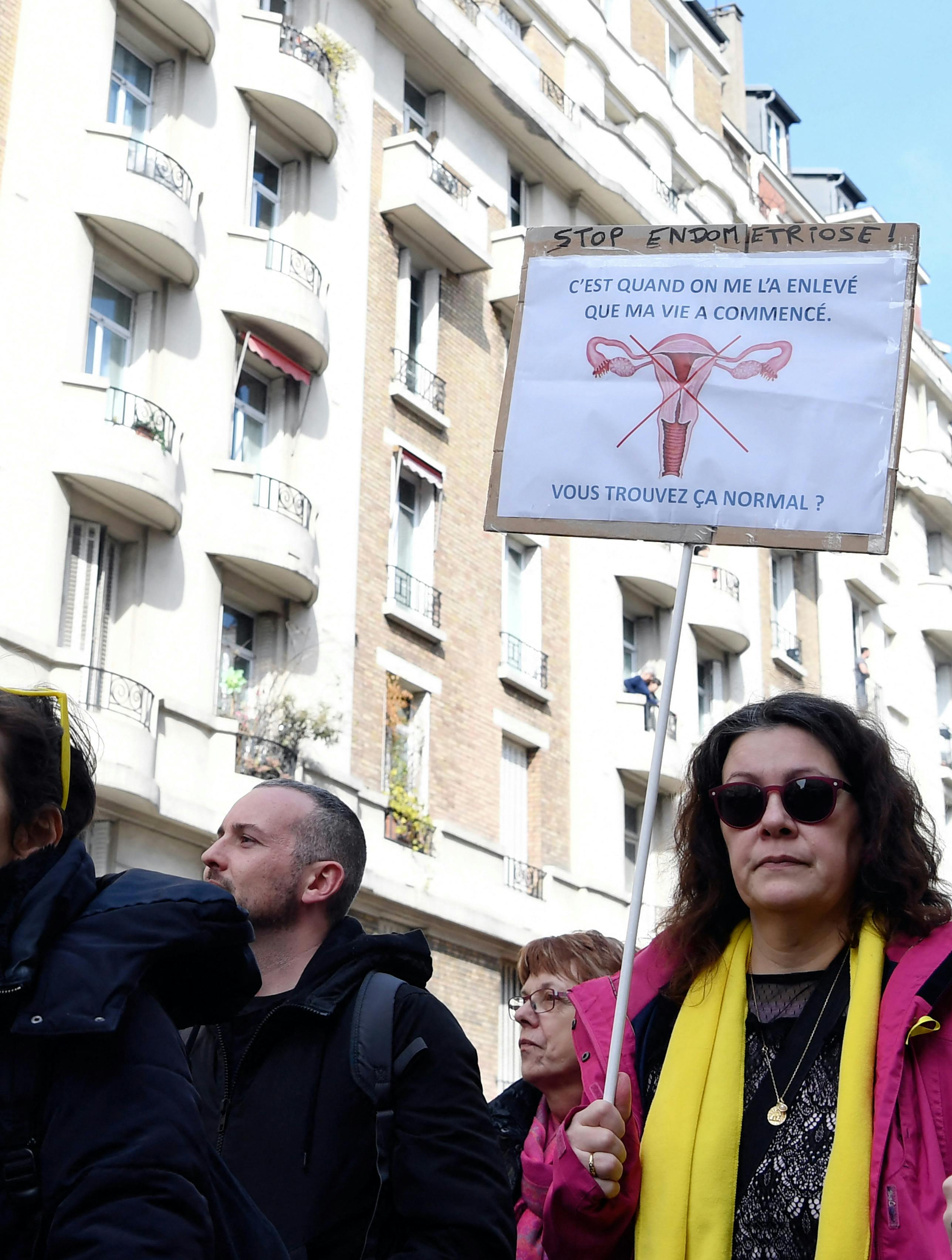 People take part in the fifth annual worldwide EndoMarch and world Endometriosis Day, hosted by the French associations Association ENDOmind and MEMS France (Mon Endometriose Ma Souffrance) on March 24, 2018, in Paris. ALAIN JOCARD / AFP