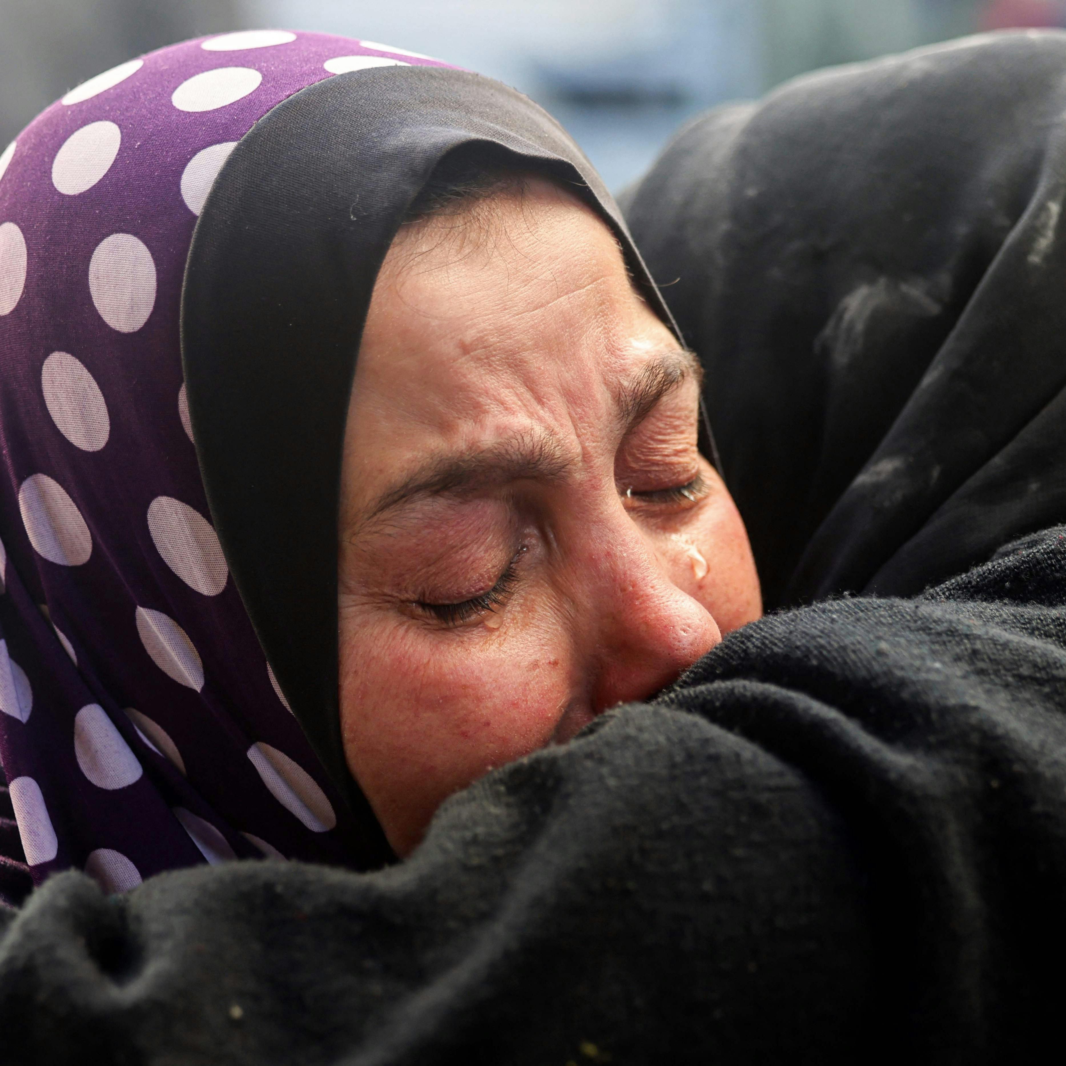 Women react upon identifying the body of a relative killed in Israeli bombardment at the Najjar hospital in Rafah in the southern Gaza Strip on February 3, 2024, as fighting continues between Israel and the Palestinian Hamas group (Photo by Mohammed ABED / AFP)