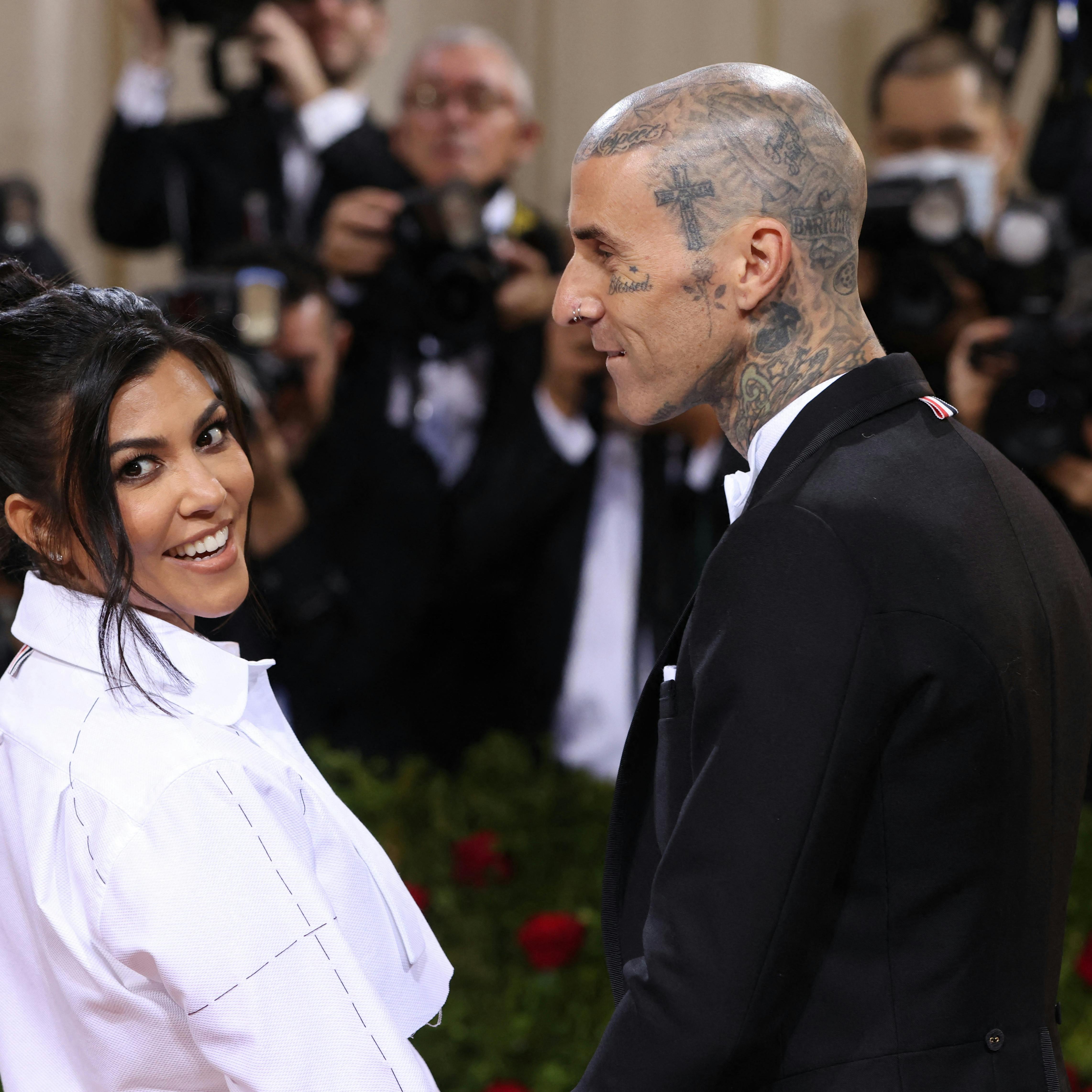 Travis Barker and Kourtney Kardashian arrive at the In America: An Anthology of Fashion themed Met Gala at the Metropolitan Museum of Art in New York City, New York, U.S., May 2, 2022. REUTERS/Andrew Kelly