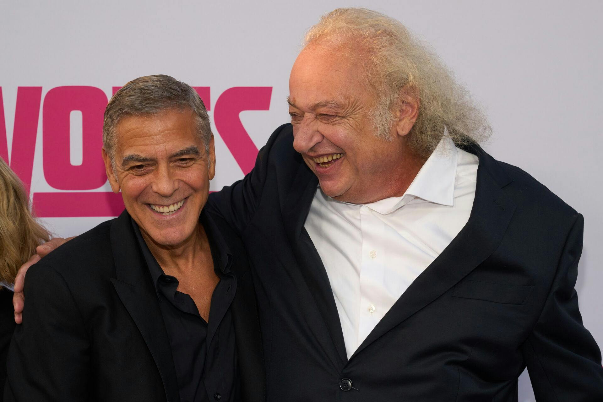 epa11613145 US actor George Clooney (L) and Danish-Croatian actor Zlatko Buric (R) attend the premiere of 'Wolfs' at the TCL Chinese Theatre in Los Angeles, California, USA, 18 September 2024. EPA/ALLISON DINNER