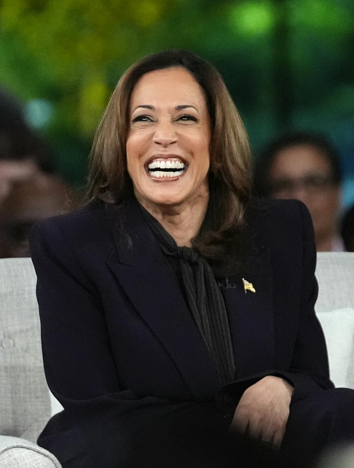 Democratic presidential nominee Vice President Kamala Harris joins Oprah Winfrey at Oprah's Unite for America Live Streaming event Thursday, Sept. 19, 2024 in Farmington Hills, Mich. (AP Photo/Paul Sancya)