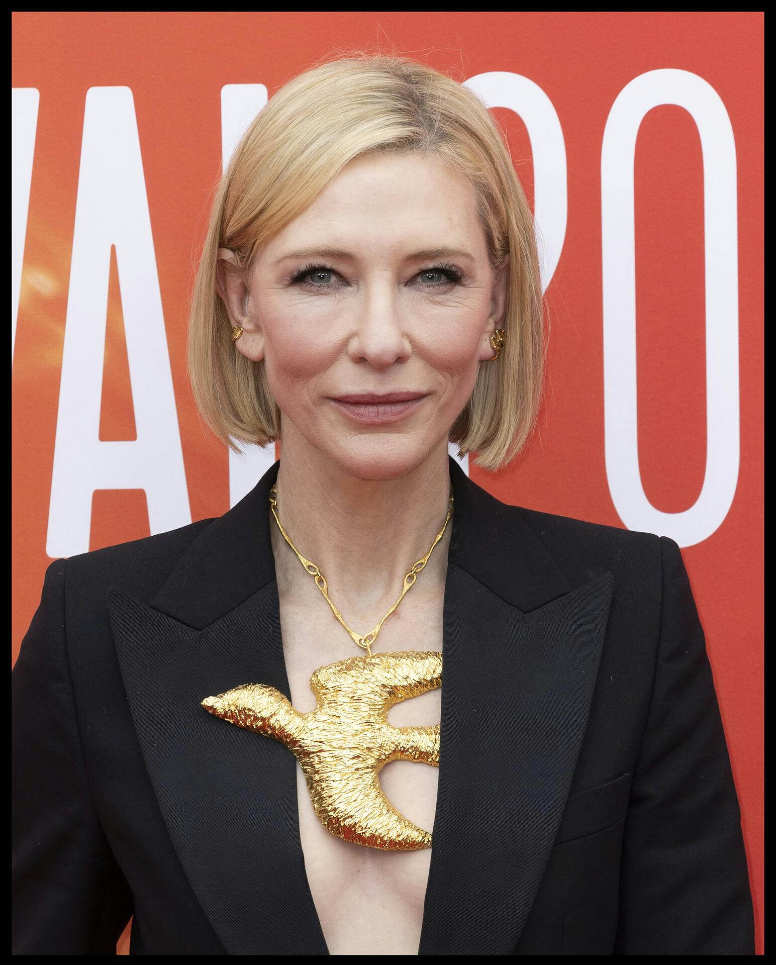 CATE BLANCHETT wears a necklace with a large golden bird as she walks the red carpet for the Disclaimer premiere at the London Film Festival.