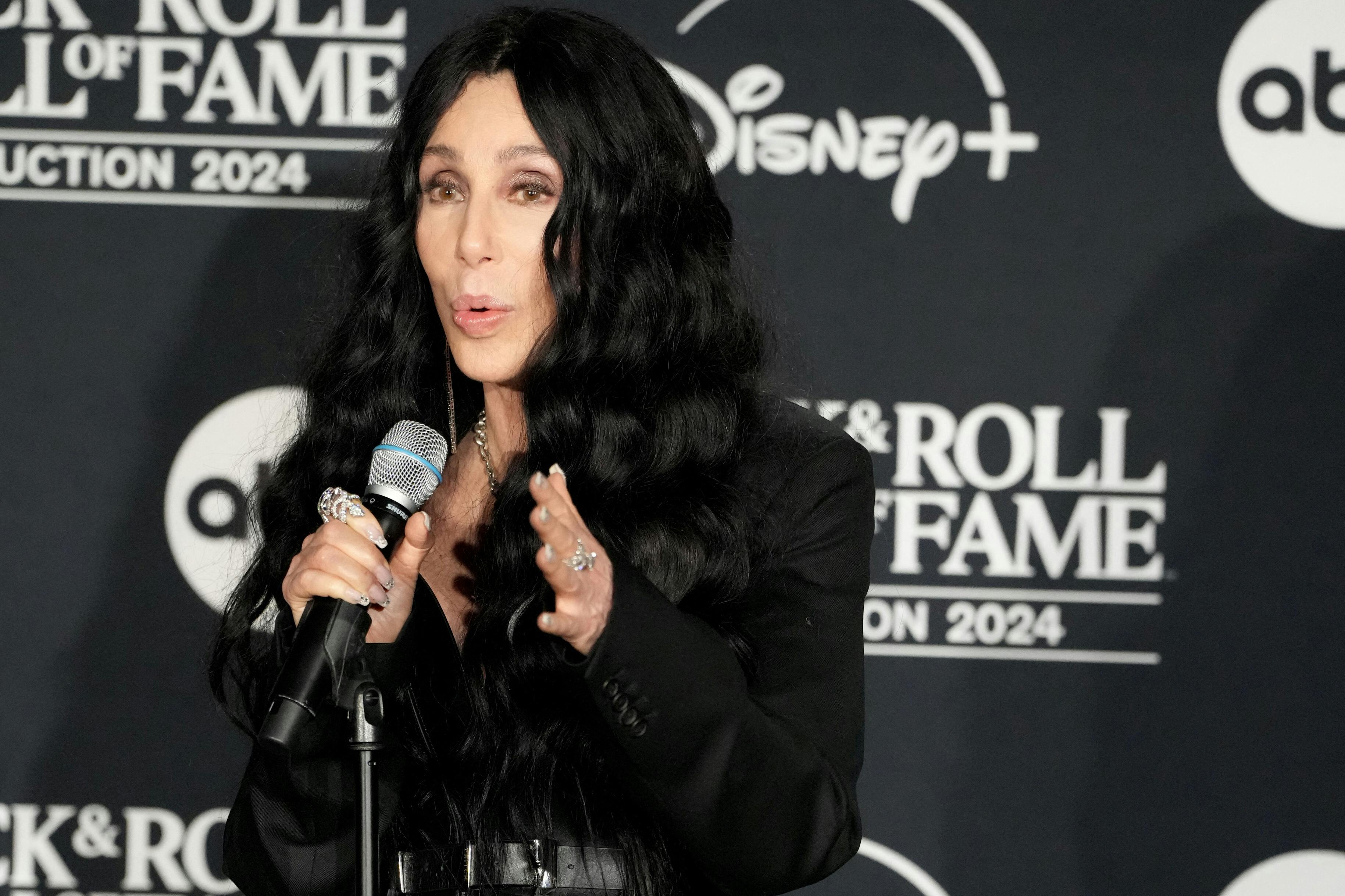 Cher speaks with journalists after she was inducted at the 2024 Rock and Roll Hall of Fame in Cleveland, Ohio, U.S. October 19, 2024. REUTERS/Ruddy Roye