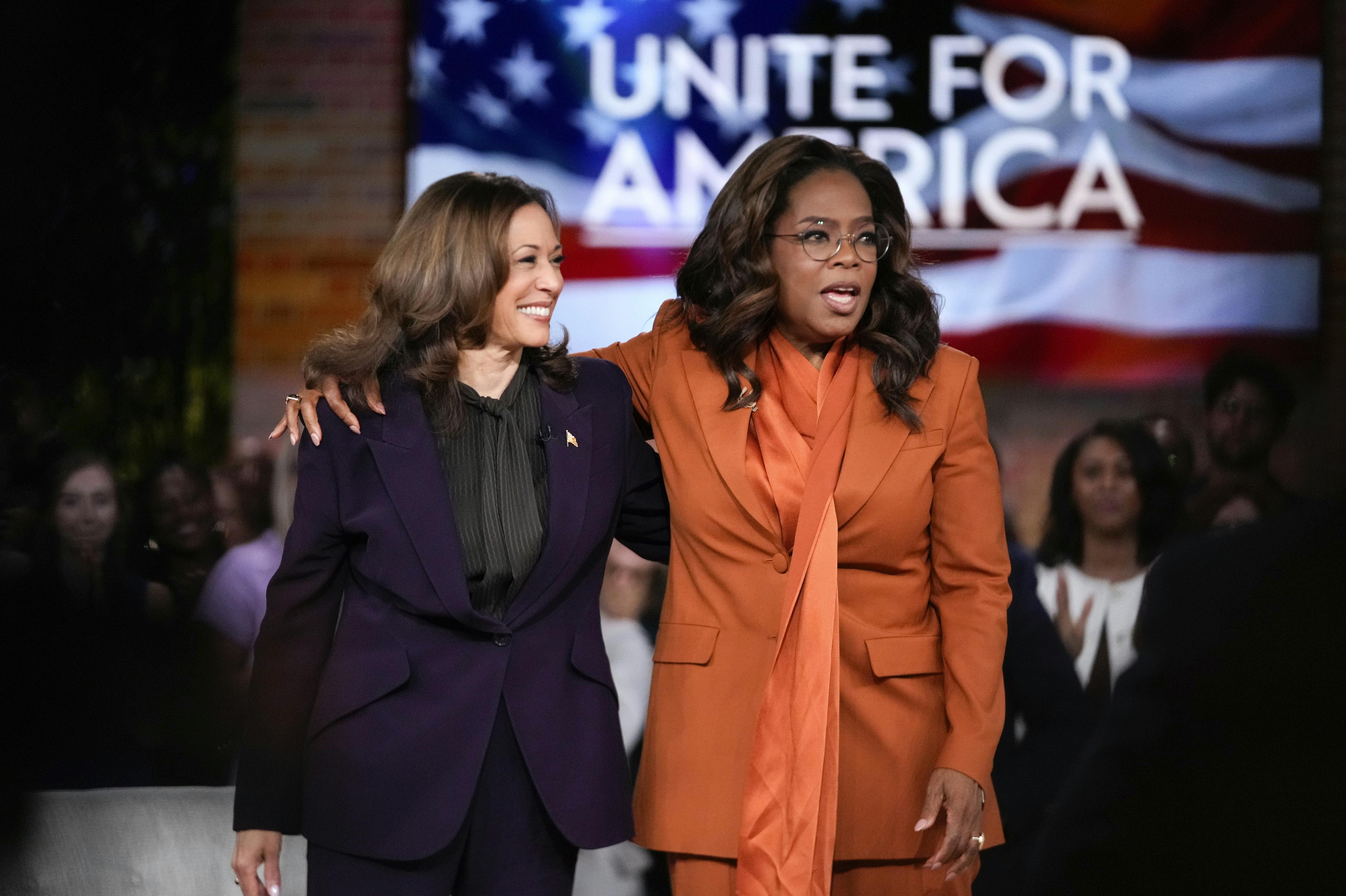 Democratic presidential nominee Vice President Kamala Harris joins Oprah Winfrey at Oprah's Unite for America Live Streaming event Thursday, Sept. 19, 2024 in Farmington Hills, Mich. (AP Photo/Paul Sancya)