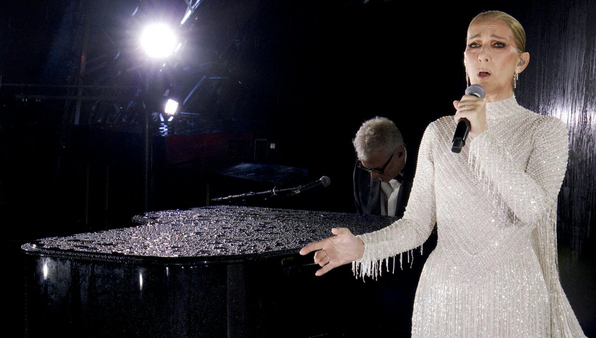 FILE PHOTO: Paris 2024 Olympics - Opening Ceremony - Paris, France - July 26, 2024. Canadian Singer Celine Dion performs at the Eiffel Tower at the conclusion of the opening ceremony of the Olympic Games Paris 2024 on July 26, 2024 in Paris, France. OLYMPIC BROADCASTING SERVICES/Pool via REUTERS/File Photo