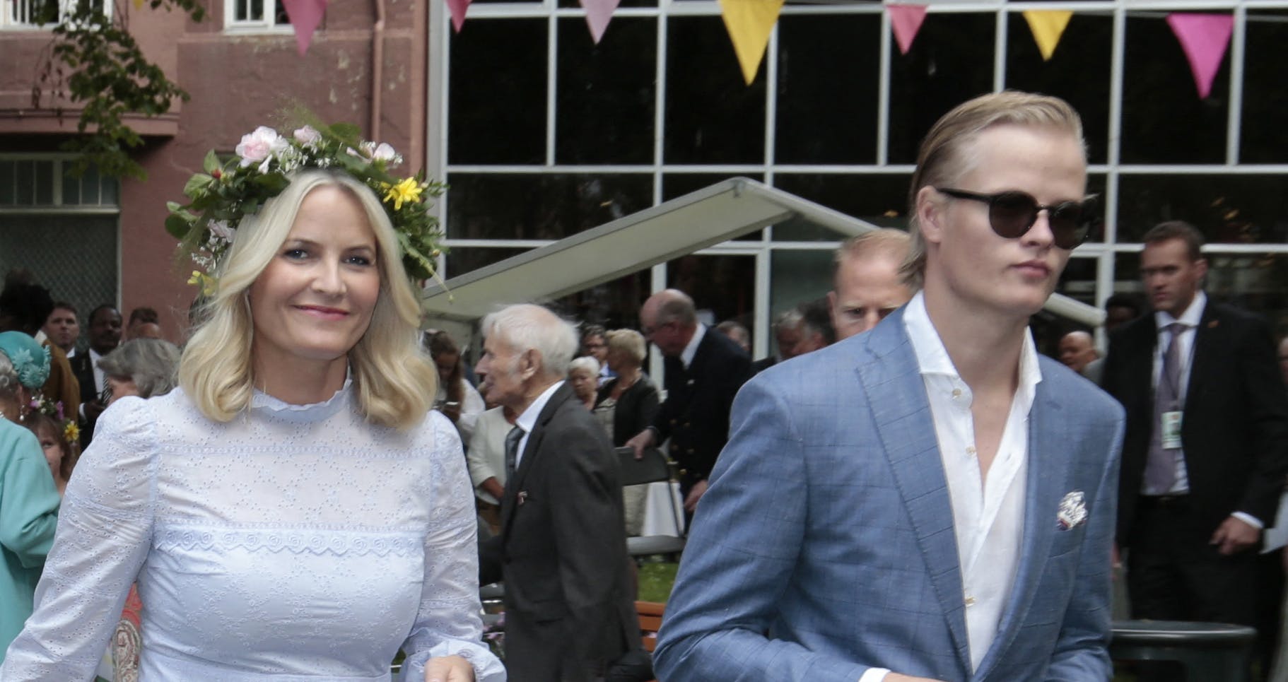 Picture taken on June 23, 2016 in Trondheim, Norway, shows Marius Borg Høiby next to his mother Norwegian Crown Princess Mette-Marit as they attend a garden party. The 27-year-old son of Norwegian Crown Princess Mette-Marit was arrested at the weekend on suspicion of assaulting a woman, police said on August 7, 2024. Mette-Marit's son Marius Borg Hoiby was born in 1997 from a relationship prior to her 2001 marriage to Norway's future king Crown Prince Haakon. (Photo by Lise Åserud / NTB / AFP) / Norway OUT