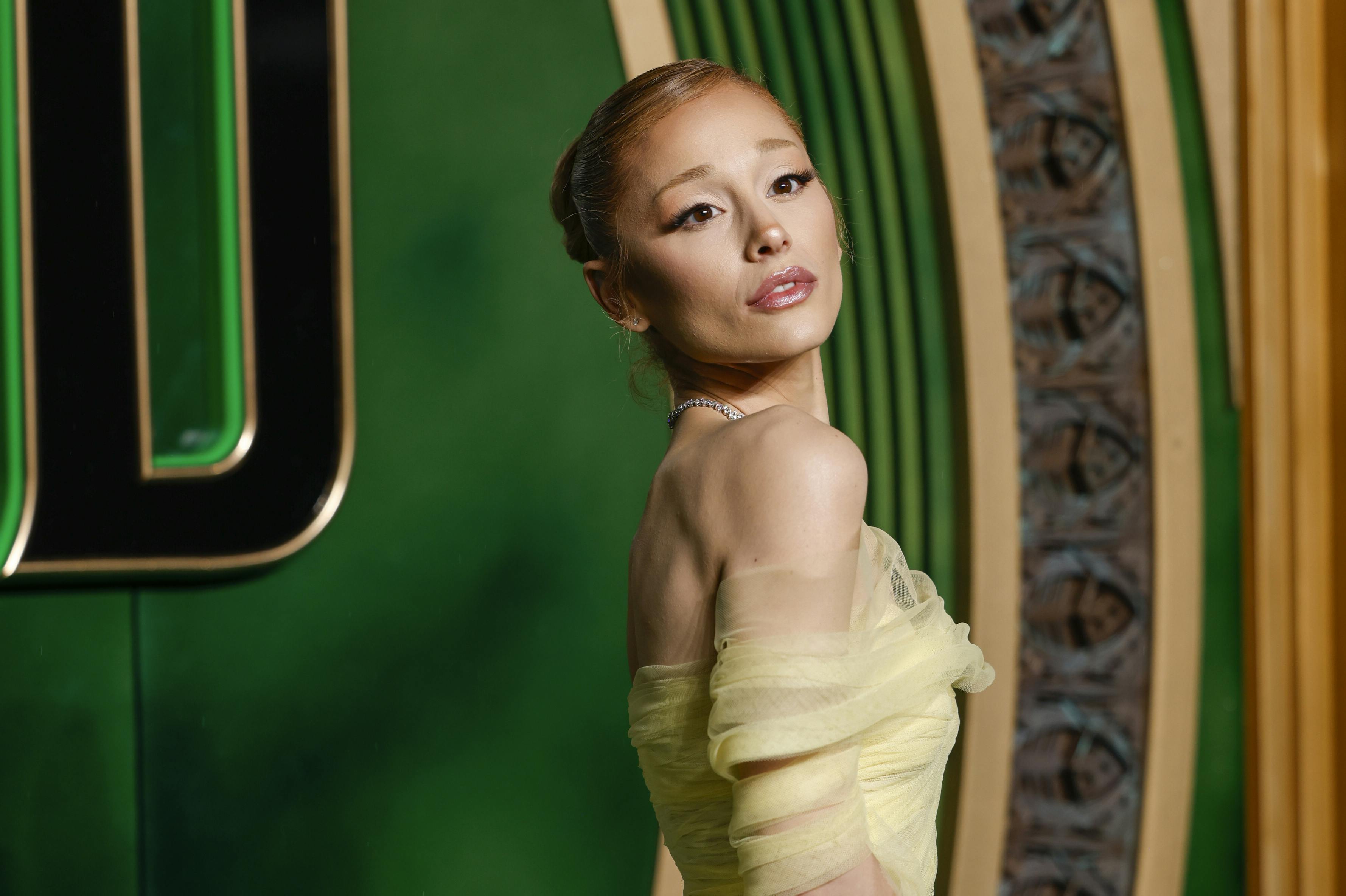 FILE - Ariana Grande poses for photographers upon arrival at the premiere of the film 'Wicked' in London, Nov. 18, 2024. (Photo by Millie Turner/Invision/AP File)