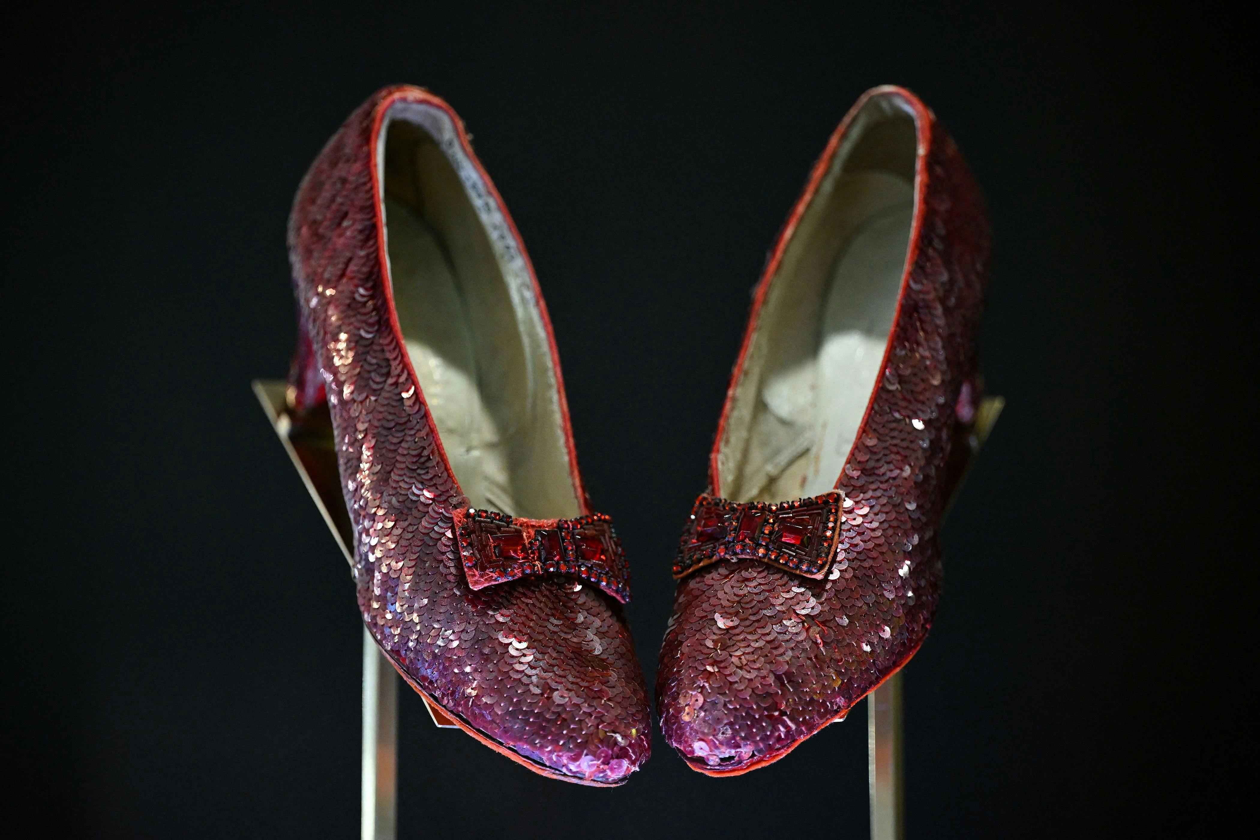 The ruby slippers worn by US actress and singer Judy Garland in the 1939 film The Wizard of Oz are pictured on display in London on November 27, 2024. The shoes will be sold at auction on December 7, 2024, with predictions they could sell for up to $3 million. (Photo by Justin TALLIS / AFP)