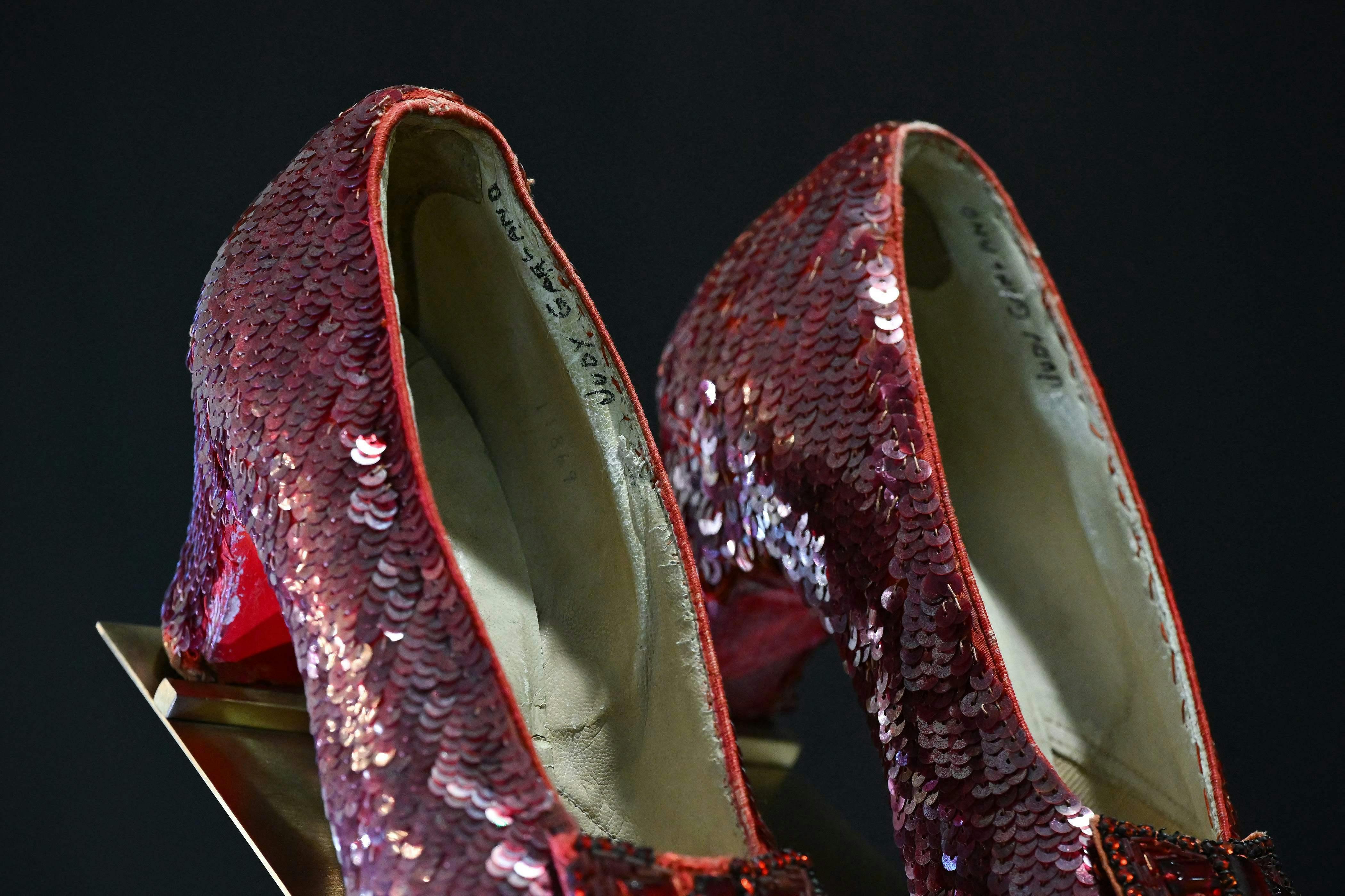 The ruby slippers worn by US actress and singer Judy Garland in the 1939 film The Wizard of Oz are pictured on display in London on November 27, 2024. The shoes will be sold at auction on December 7, 2024, with predictions they could sell for up to $3 million. (Photo by Justin TALLIS / AFP)