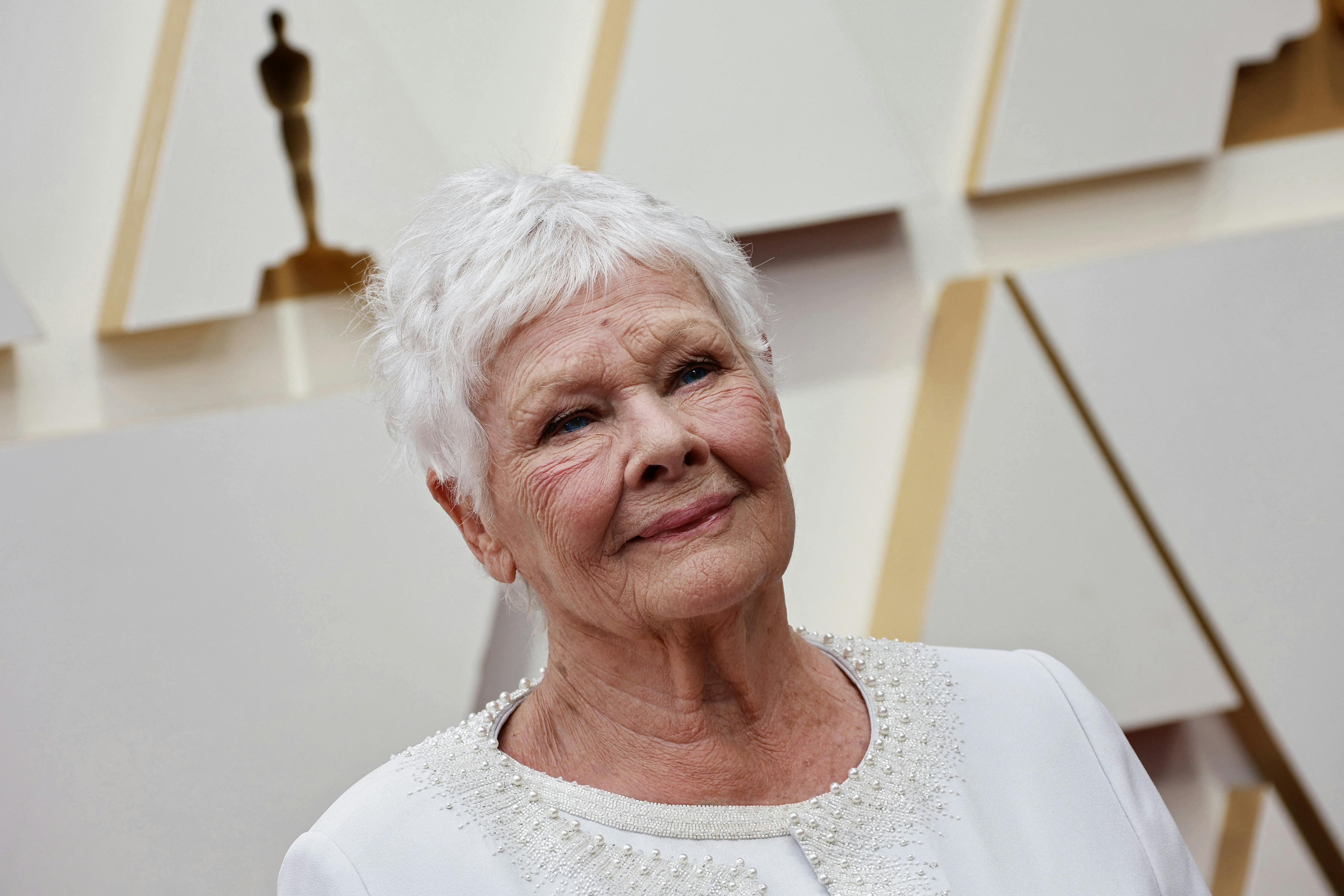 Judy Dench poses on the red carpet during the Oscars arrivals at the 94th Academy Awards in Hollywood, Los Angeles, California, U.S., March 27, 2022. REUTERS/Eric Gaillard