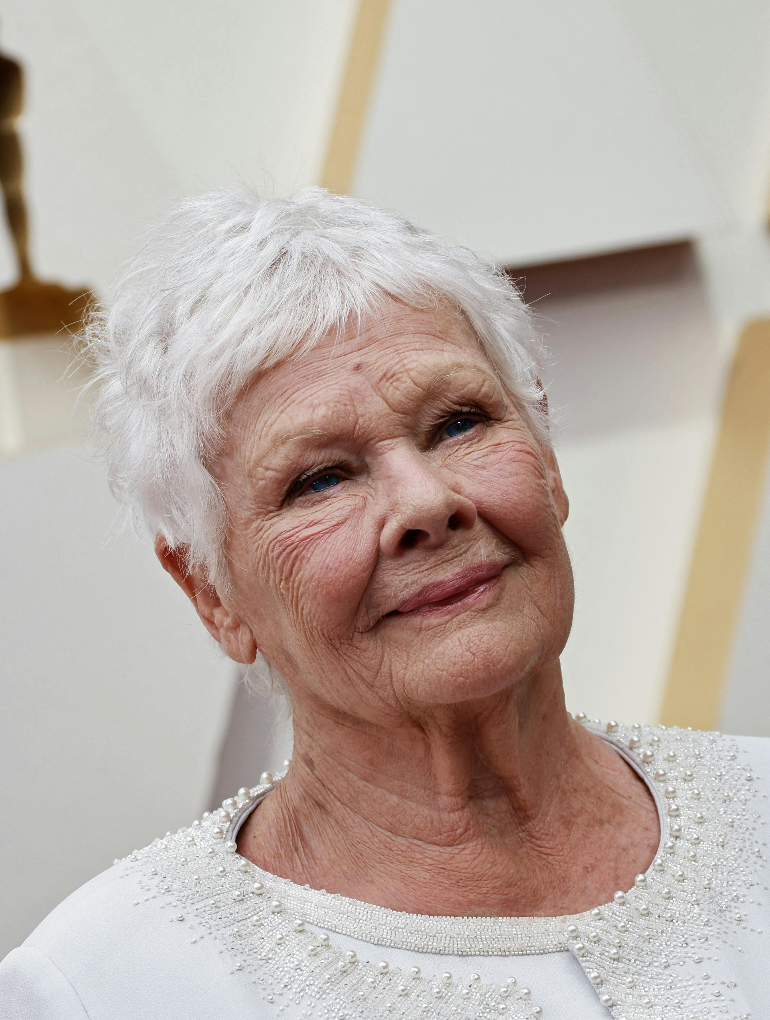 Judy Dench poses on the red carpet during the Oscars arrivals at the 94th Academy Awards in Hollywood, Los Angeles, California, U.S., March 27, 2022. REUTERS/Eric Gaillard