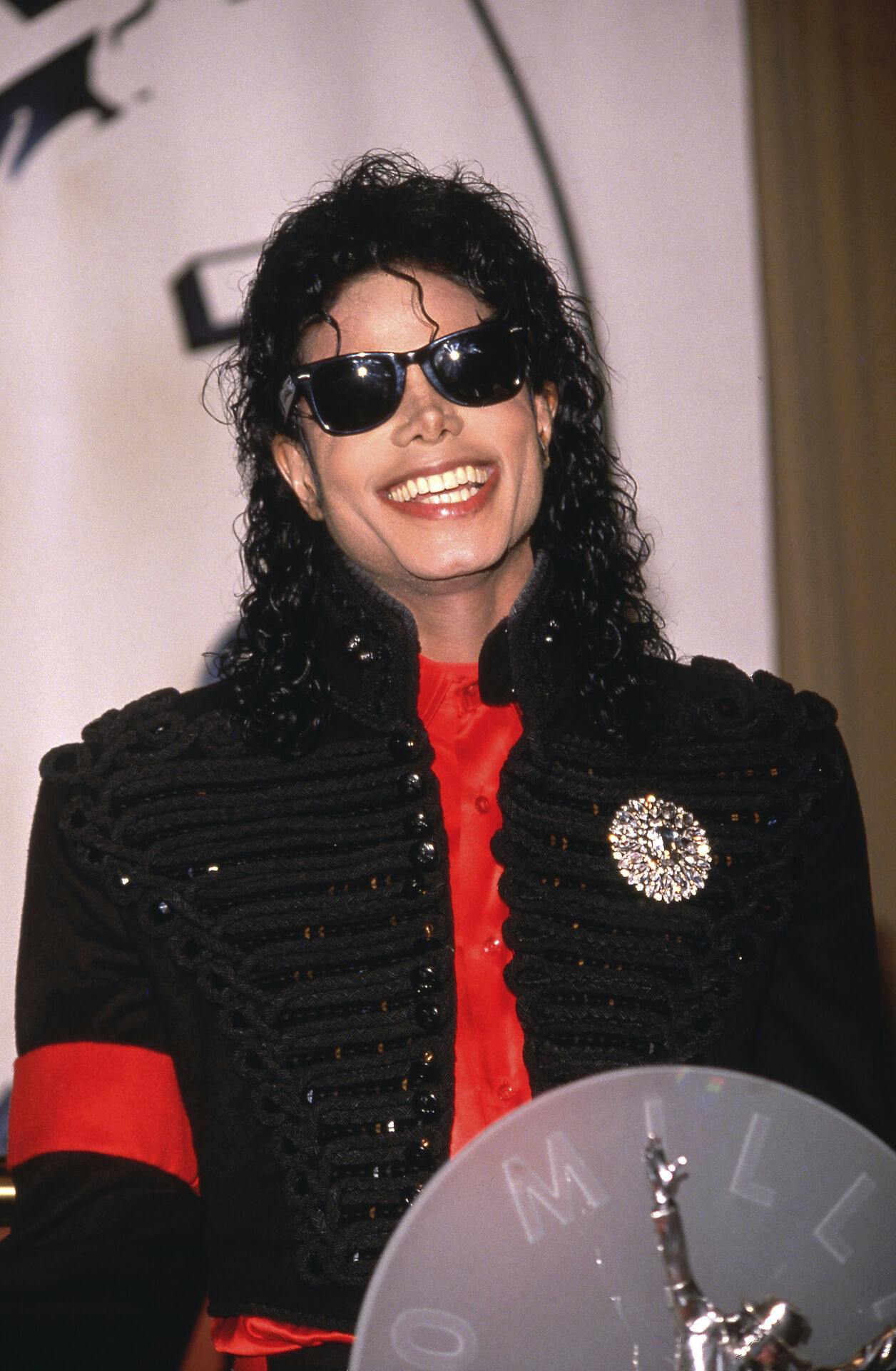 Michael Jackson at an award ceremony held by CBS Records February 20, 1990 in Los Angeles, CA. Jackson, who was the lead singer for the Jackson Five by age eight, reached the peak of his solo career with 1982's "Thriller, " the best-selling album of all time and recipient of eight Grammy awards Credit: Ralph Dominguez/MediaPunch /IPX