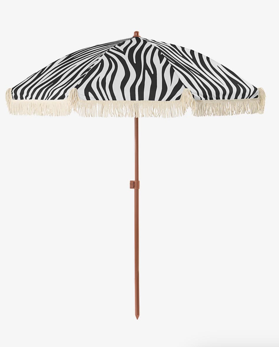 https://imgix.femina.dk/2025-04-07/parasol-zebra.png