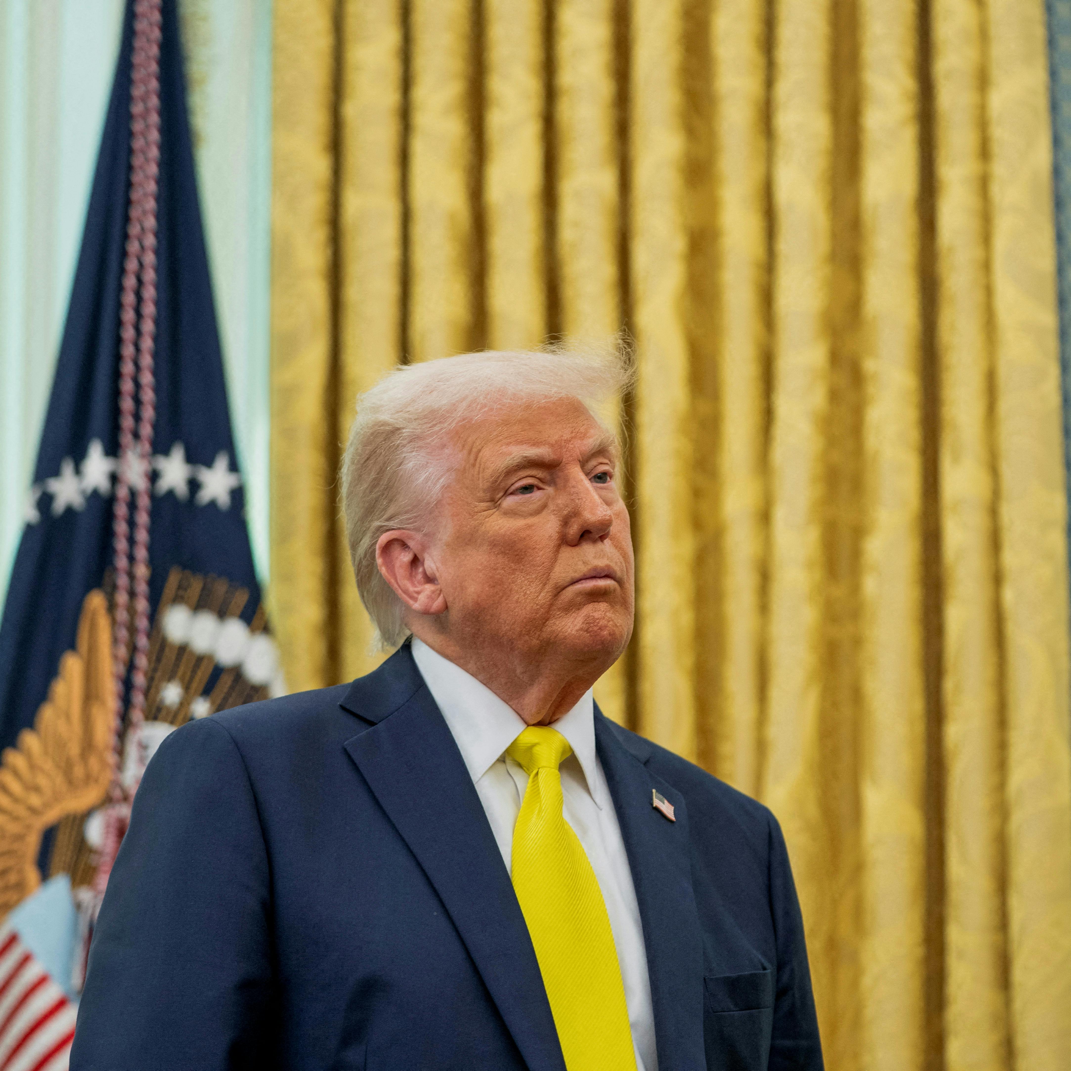 FILE PHOTO: U.S. President Donald Trump listens to remarks during a swearing-in ceremony for Administrator of the Centers for Medicare and Medicaid Services Mehmet Oz in the Oval Office in Washington, D.C., U.S., April 18, 2025. REUTERS/Nathan Howard/File Photo