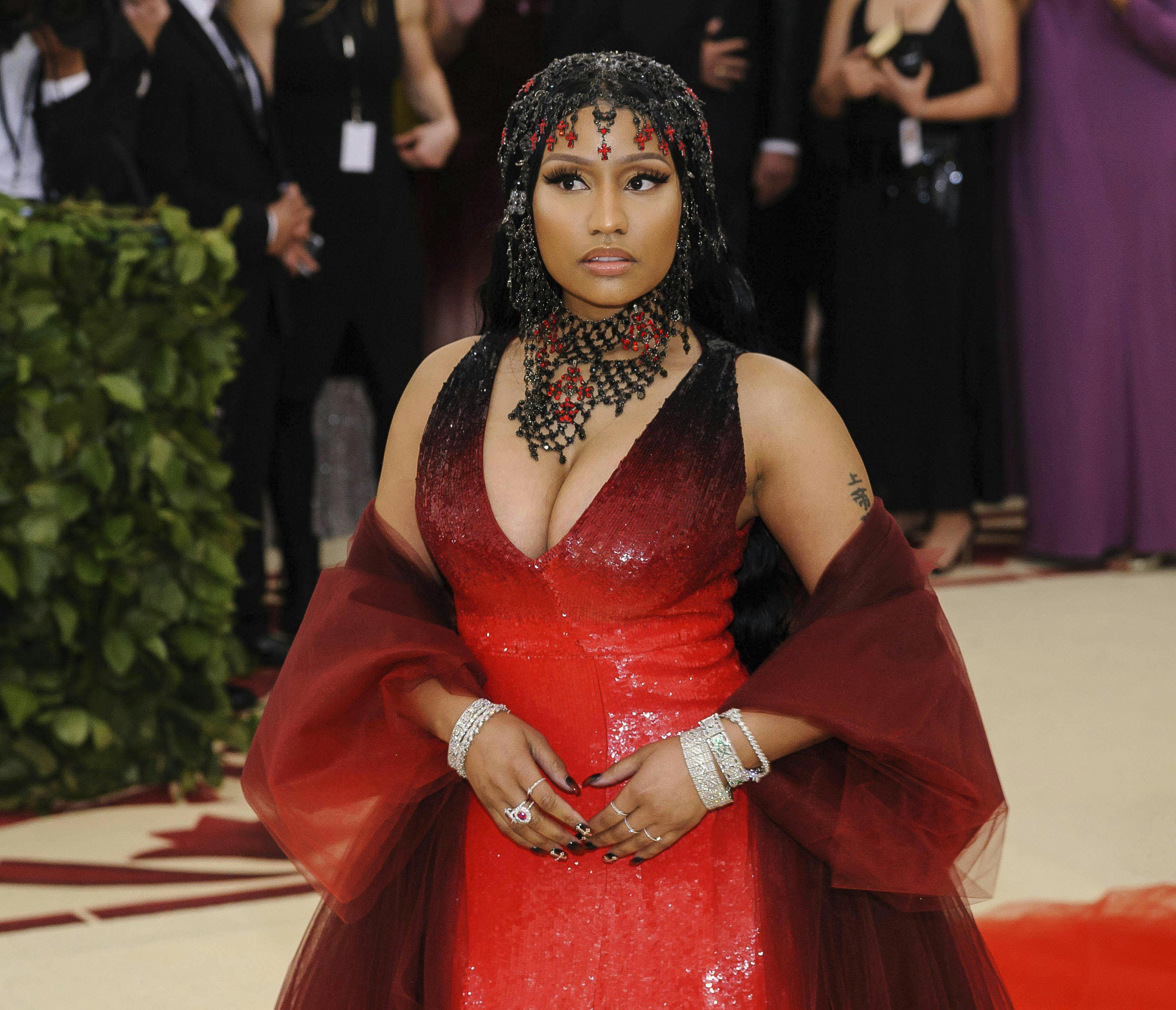 JANUARY 4th 2025: Nicki Minaj is sued for assault and battery by a former tour manager. Brandon Garrett has filed a lawsuit in Los Angeles Superior Court claiming Minaj "physically attacked him" backstage at a concert in Detroit in April 2024. - File Photo by: zz/ESBP/STAR MAX/IPx 2018 5/7/18 Nicki Minaj at the 2018 Costume Institute Benefit Gala celebrating the opening of "Heavenly Bodies: Fashion and the Catholic Imagination" held on May 7, 2018 at The Metropolitan Museum of Art in New York City. (NYC)