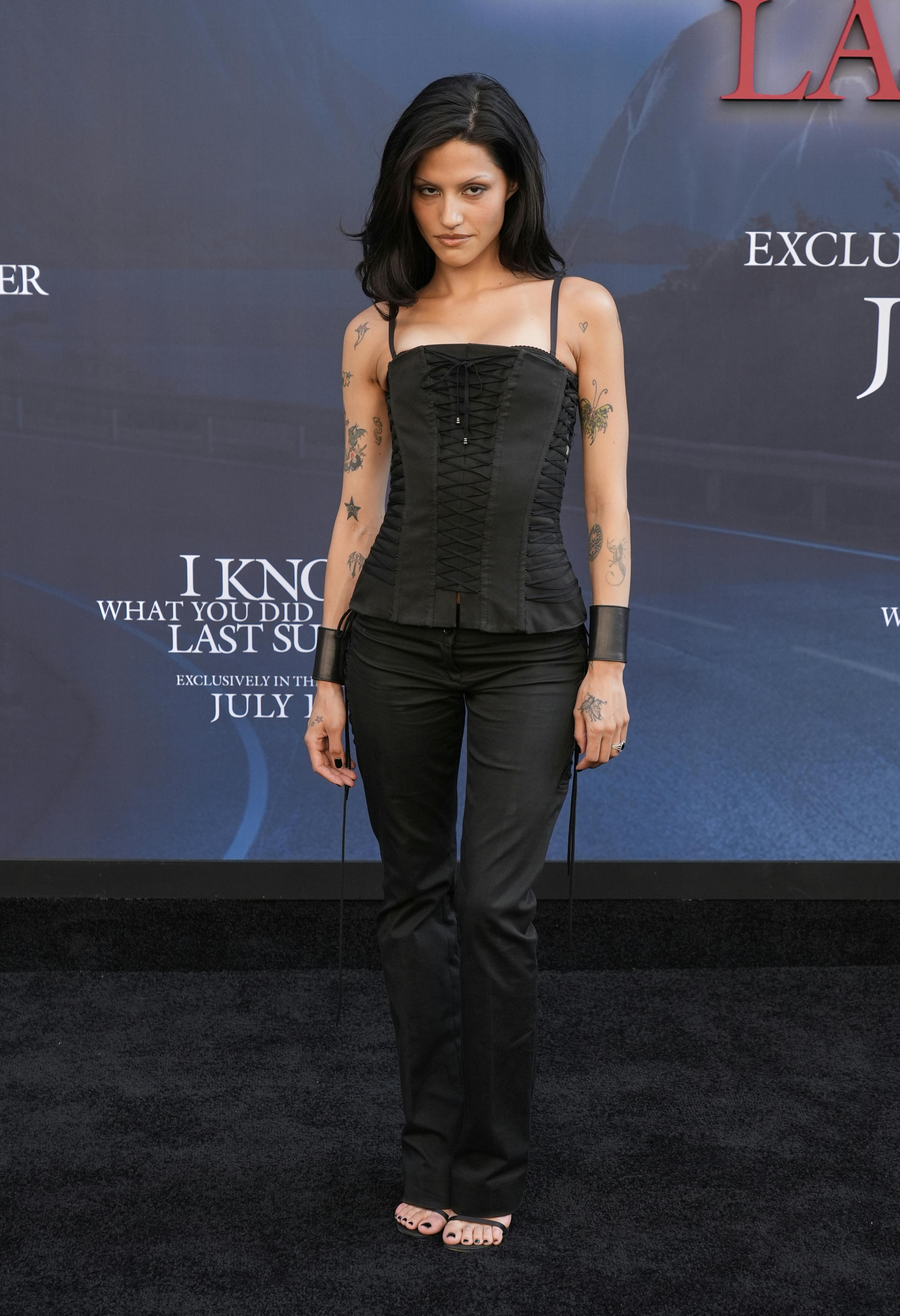 Gabbriette Bechtel, a cast member in "I Know What You Did Last Summer, " poses at the premiere of the film at The United Theater on Broadway, Monday, July 14, 2025, in Los Angeles (AP Photo/Chris Pizzello)