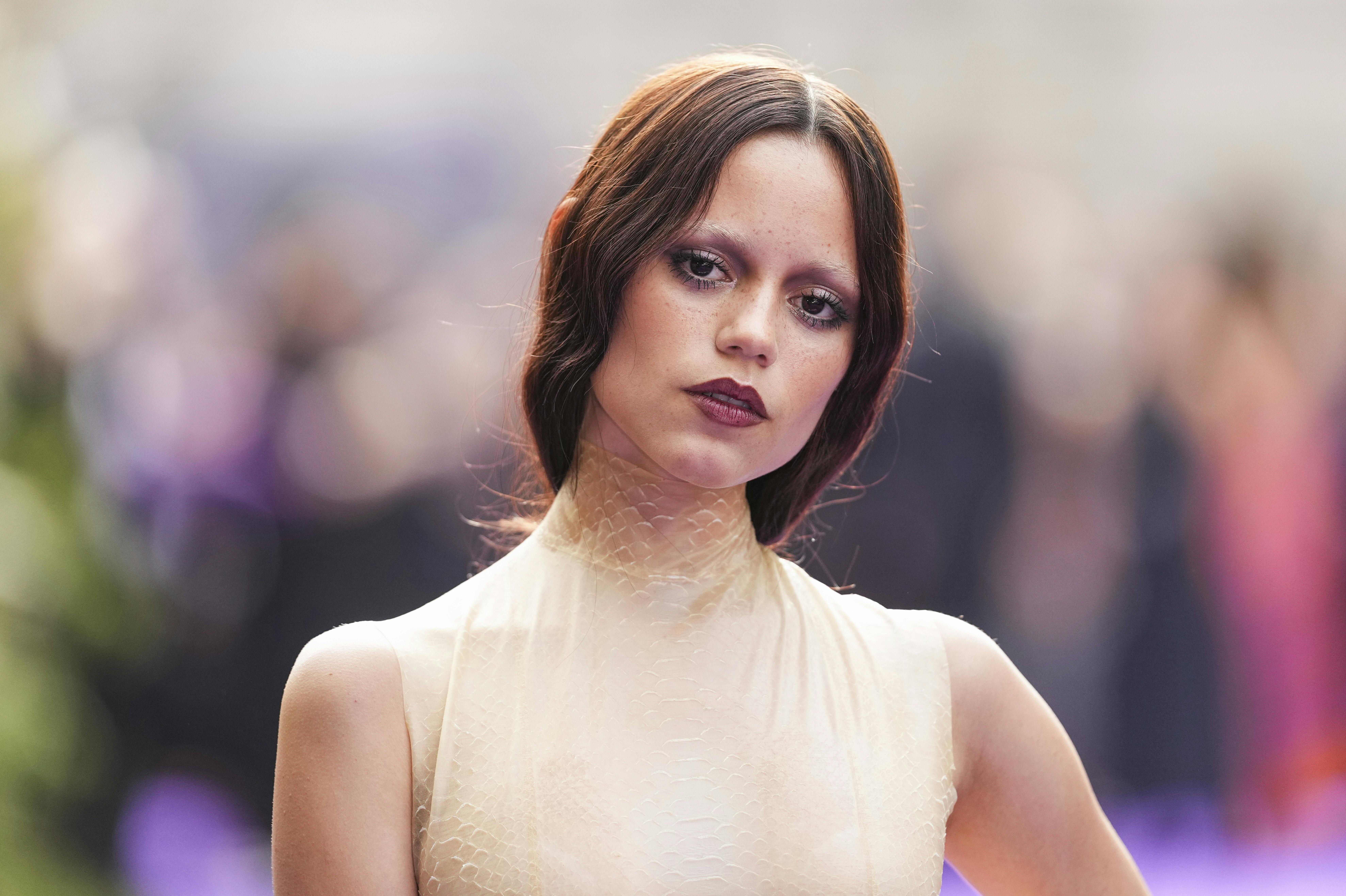 Jenna Ortega poses for photographers upon arrival at the premiere of the the television series 'Wednesday' on Wednesday, July 30, 2025, in London. (Photo by Scott A Garfitt/Invision/AP)