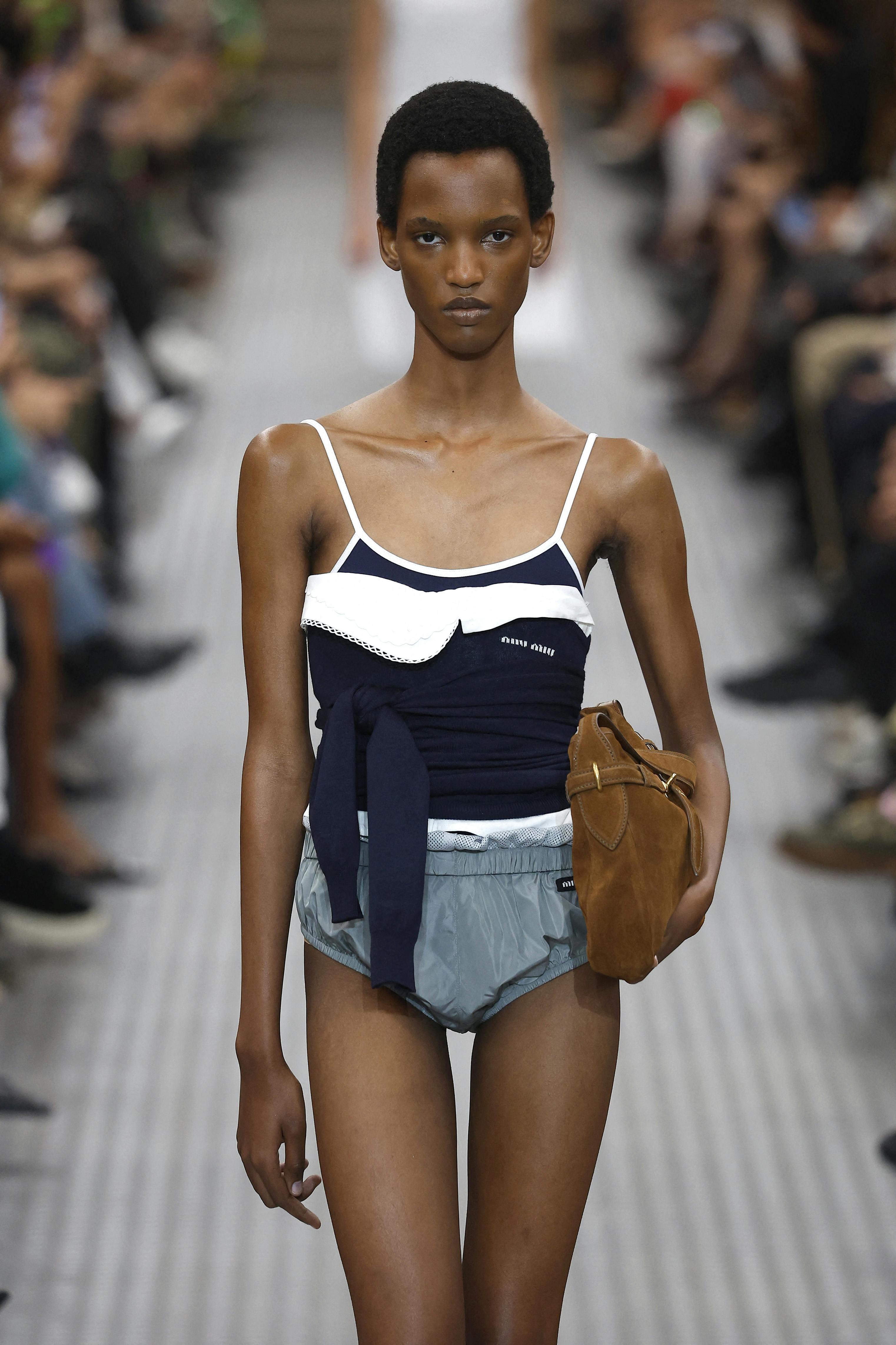 Miu Miu - Paris Fashion Week. Ready to Wear. Spring/Summer 2025. 01 Oct 2024 Pictured: Miu Miu SS25. Photo credit: CAMERA PRESS / MEGA TheMegaAgency.com +1 888 505 6342 (Mega Agency TagID: MEGA1208164_083.jpg) [Photo via Mega Agency]