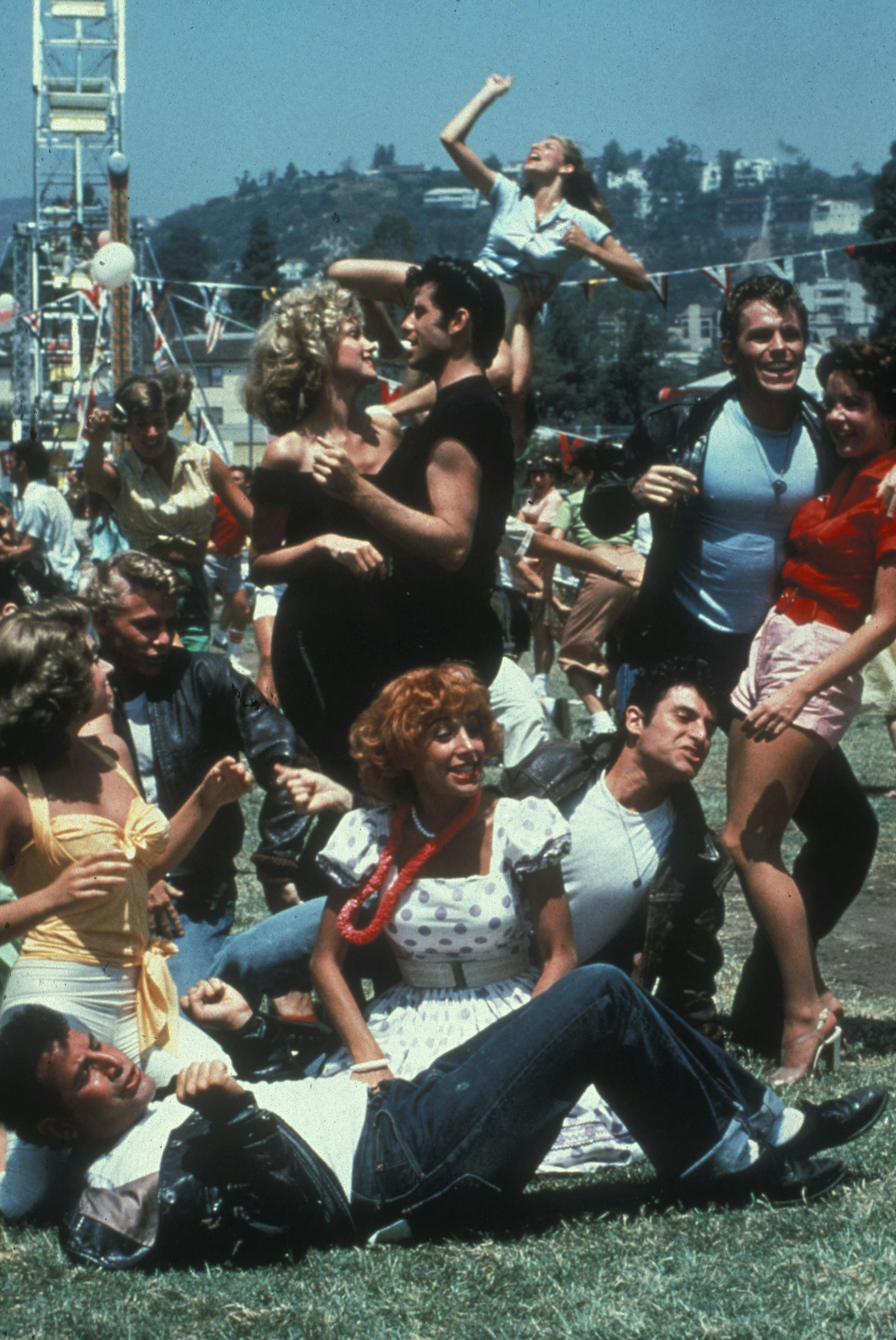 "Grease"John Travolta, Olivia Newton-John, Jeff Conway, Stockard Channing, Didi Conn, Michael Tucci, Barry Pearl, Kelly Ward, Dinah Manoff © 1978 Paramount (Mega Agency TagID: MEGAM6557_139227.jpg) [Photo via Mega Agency]