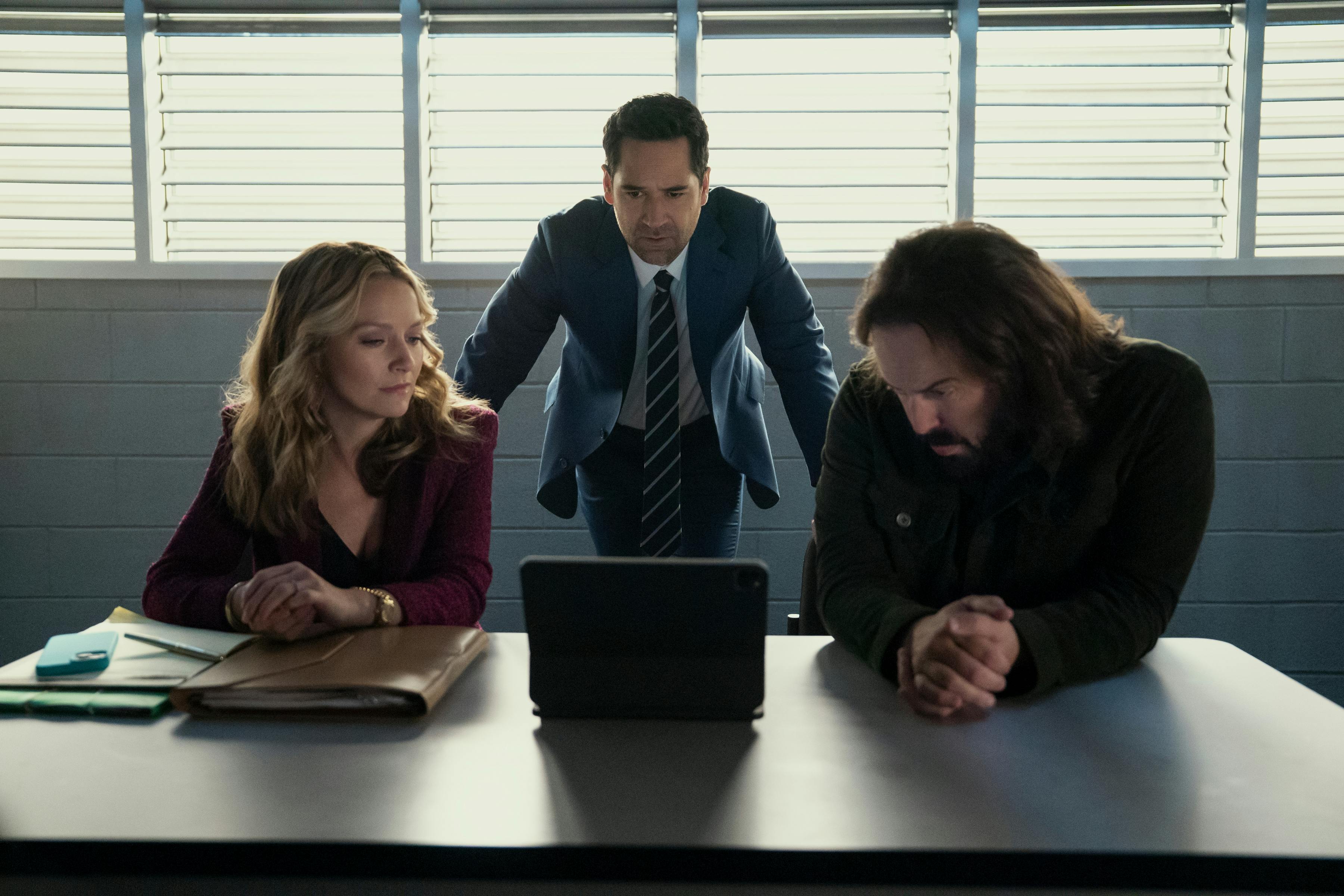 The Lincoln Lawyer. (L to R) Becki Newton as Lorna Crane, Manuel Garcia-Rulfo as Mickey Haller, Angus Sampson as Denis "Cisco" Wojciechowski in episode 402 of The Lincoln Lawyer. Cr. Kim Alexis/Netflix © 2026