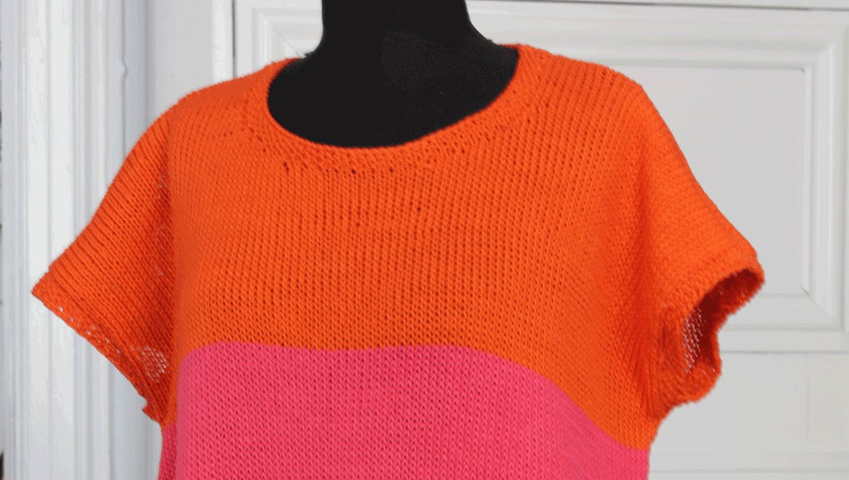 https://imgix.femina.dk/media/article/1221-strik-pink-orange-bluse.png