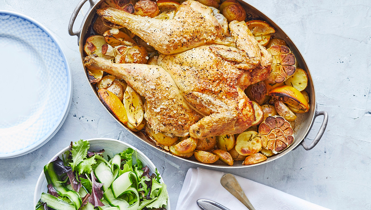 Sommerfuglekylling med hvidløg, citron og kartofler 